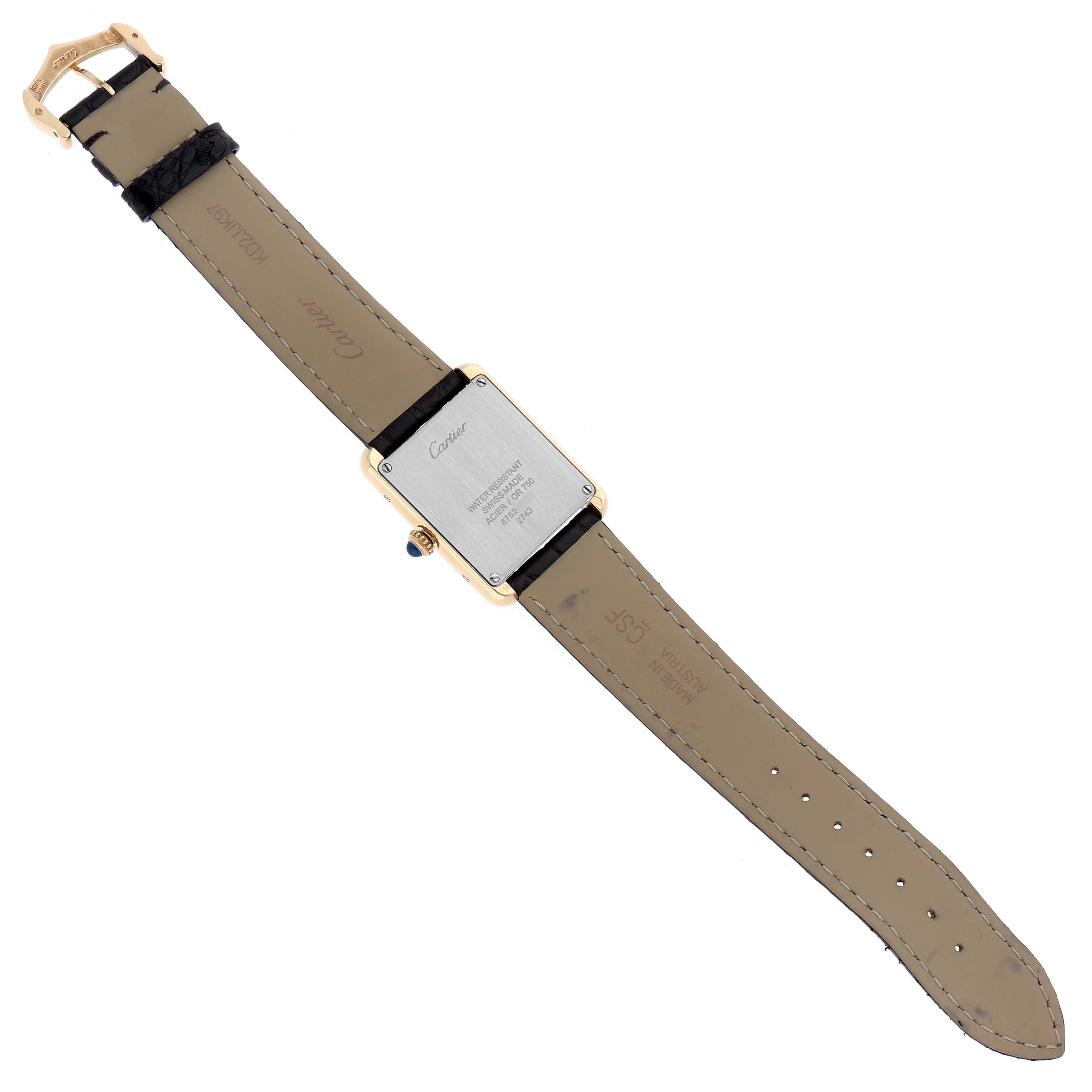 The image shows the back of a Cartier Tank Solo W1018755 Women
s Yellow Gold Silver Dial watch, highlighting the case back, strap, and buckle from a flat angle.