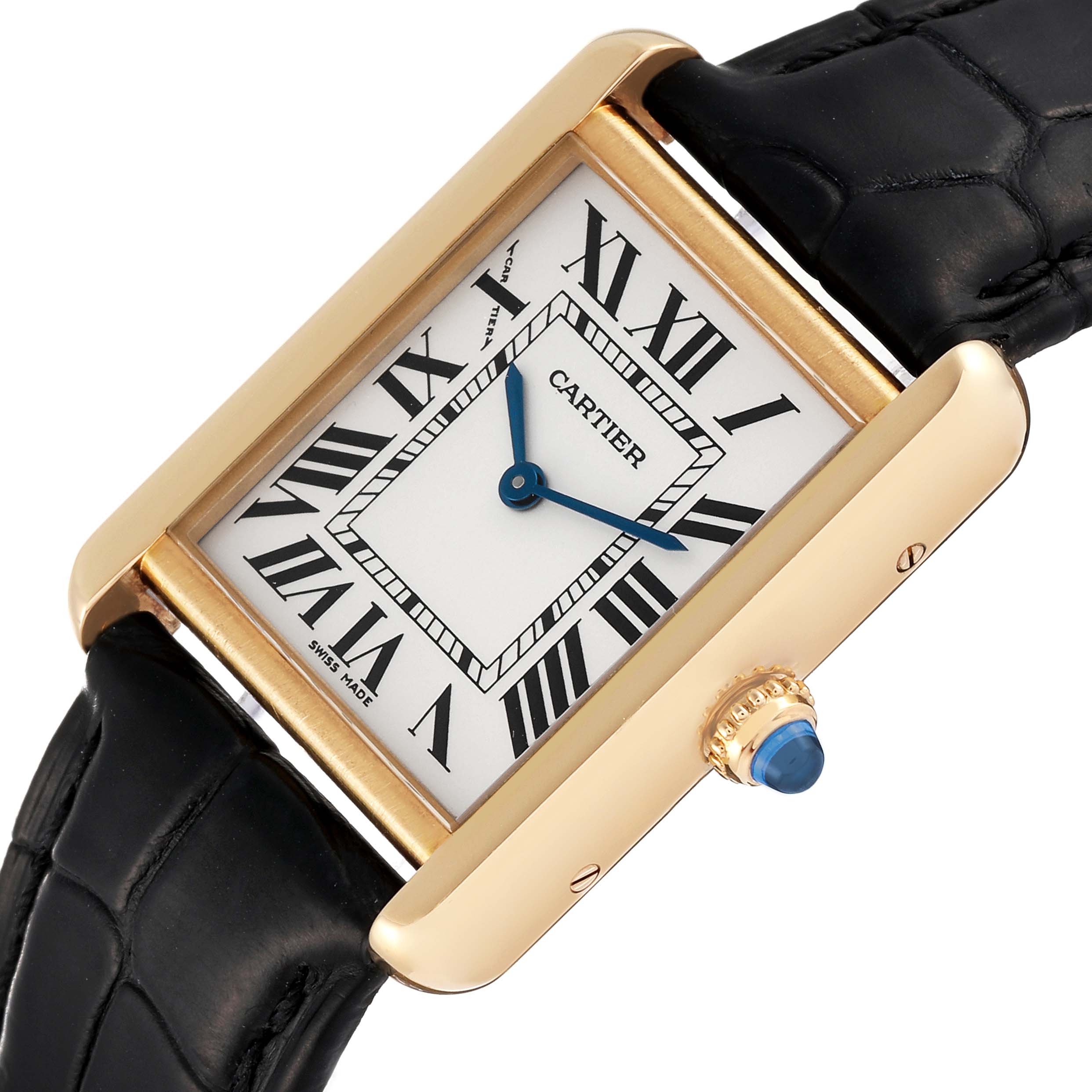 The image shows a close-up angle of the Cartier Tank Solo W1018755 Women's Yellow Gold Silver Dial W1018755 Women's Yellow Gold Silver Dial watch, highlighting its square dial, Roman numerals, and crown.