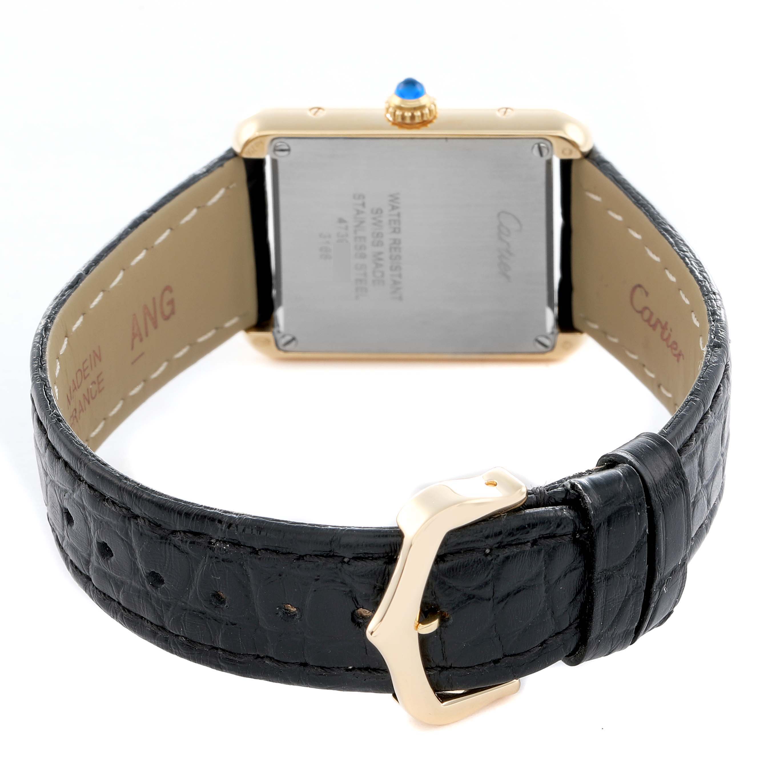 The Cartier Tank Solo W5200002 Women
s Steel and Gold (two tone) Silver Dial watch is shown from the back, displaying its case, lugs, and black leather strap with a gold buckle.