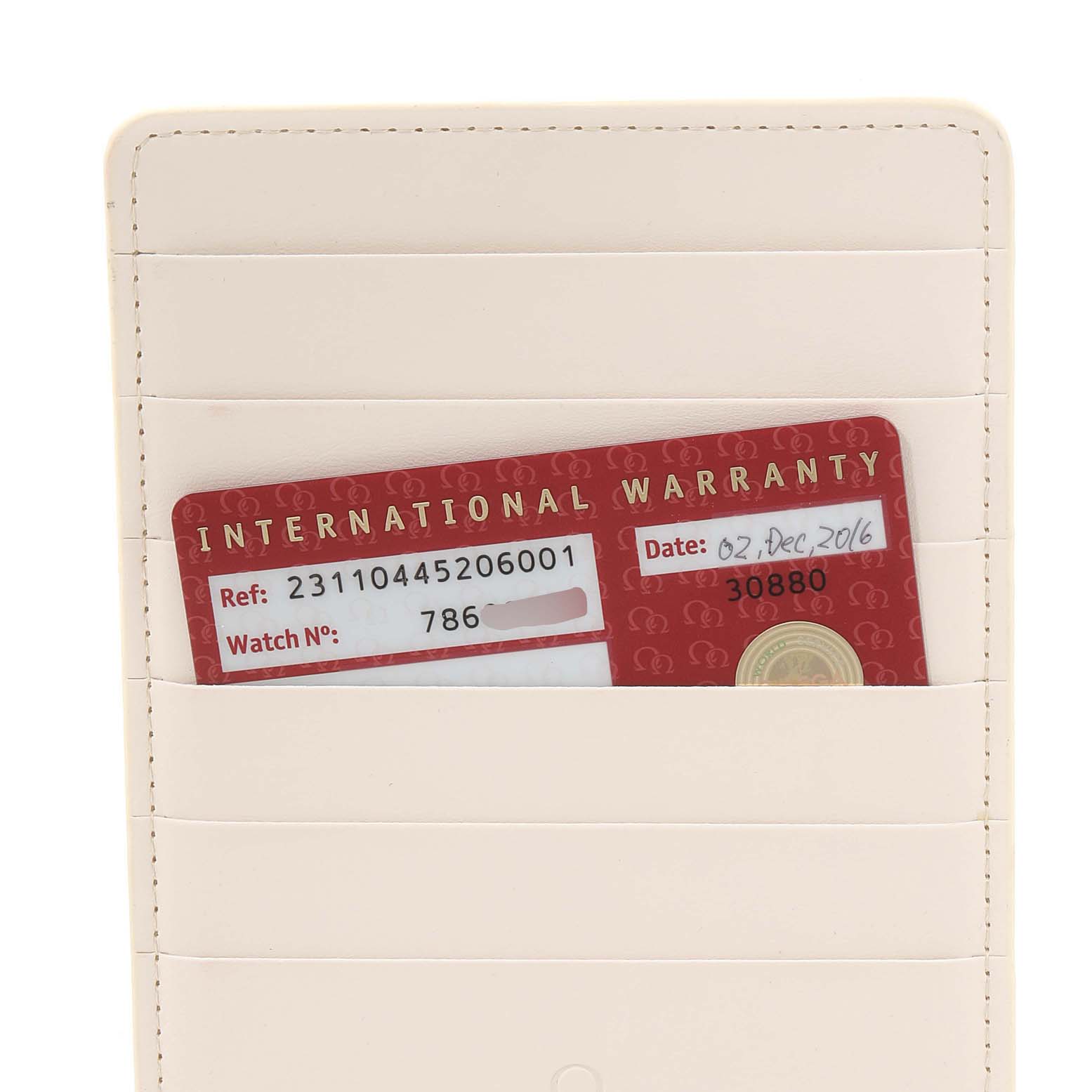 The image shows an international warranty card for an Omega Aqua Terra 231.10.44.52.06.001 Men's Stainless Steel Grey Dial 231.10.44.52.06.001 Men's Stainless Steel Grey Dial watch in a beige cardholder.