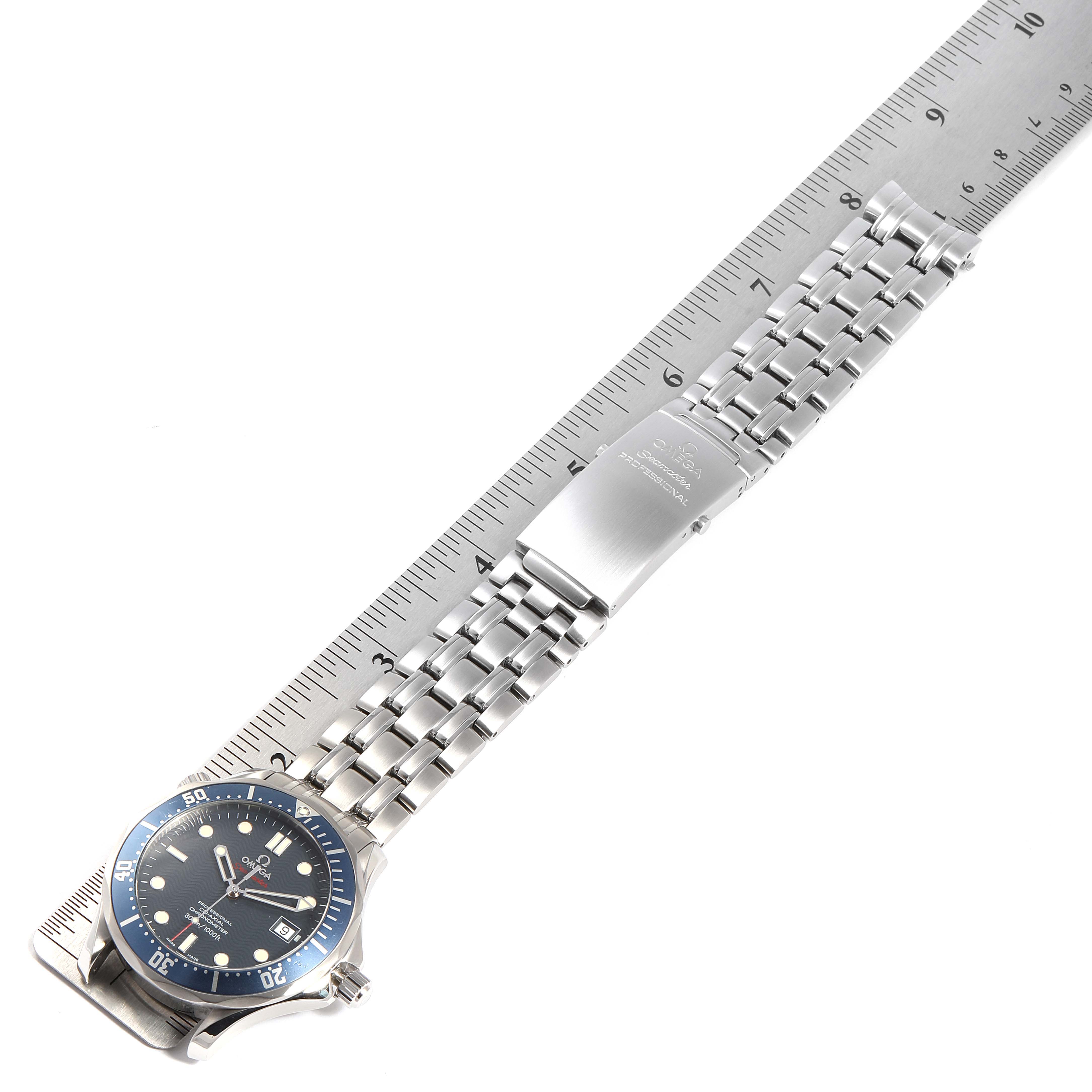 The Omega Seamaster 2220.80.00 Men's Stainless Steel Blue Dial 2220.80.00 Men's Stainless Steel Blue Dial watch is shown from the top angle with its bracelet fully extended and a ruler for size reference.