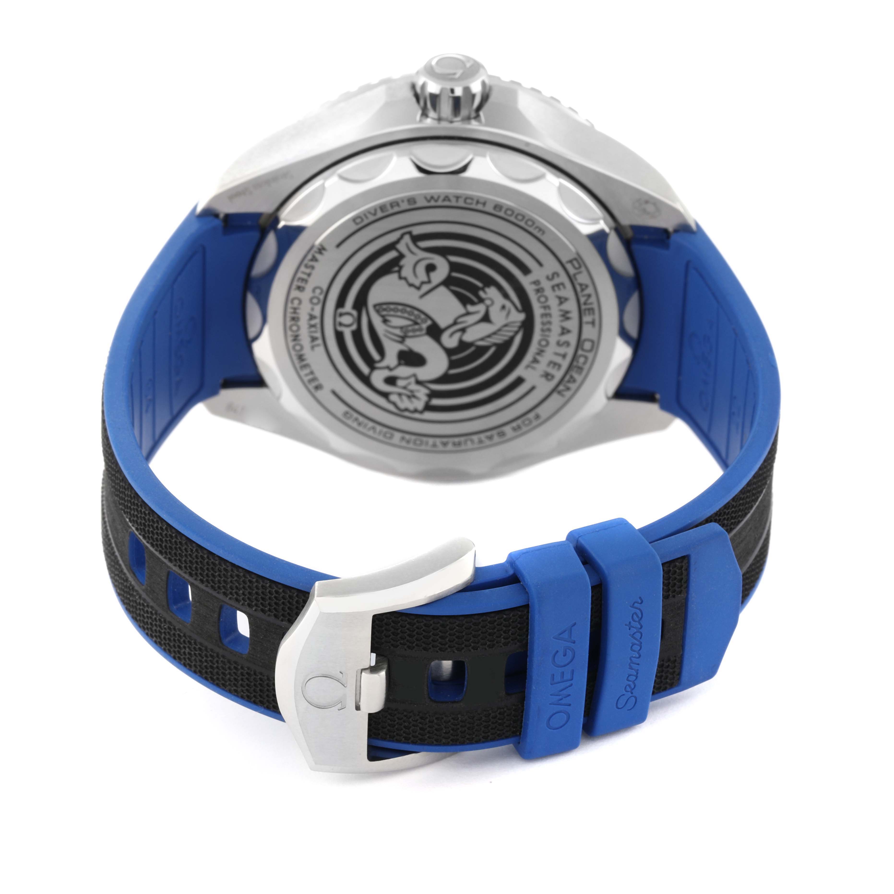 This image shows the back and clasp of the Omega Planet Ocean 215.32.46.21.04.001 Men's Stainless Steel White Dial 215.32.46.21.04.001 Men's Stainless Steel White Dial watch, with a focus on the case back and the blue and black watch strap.