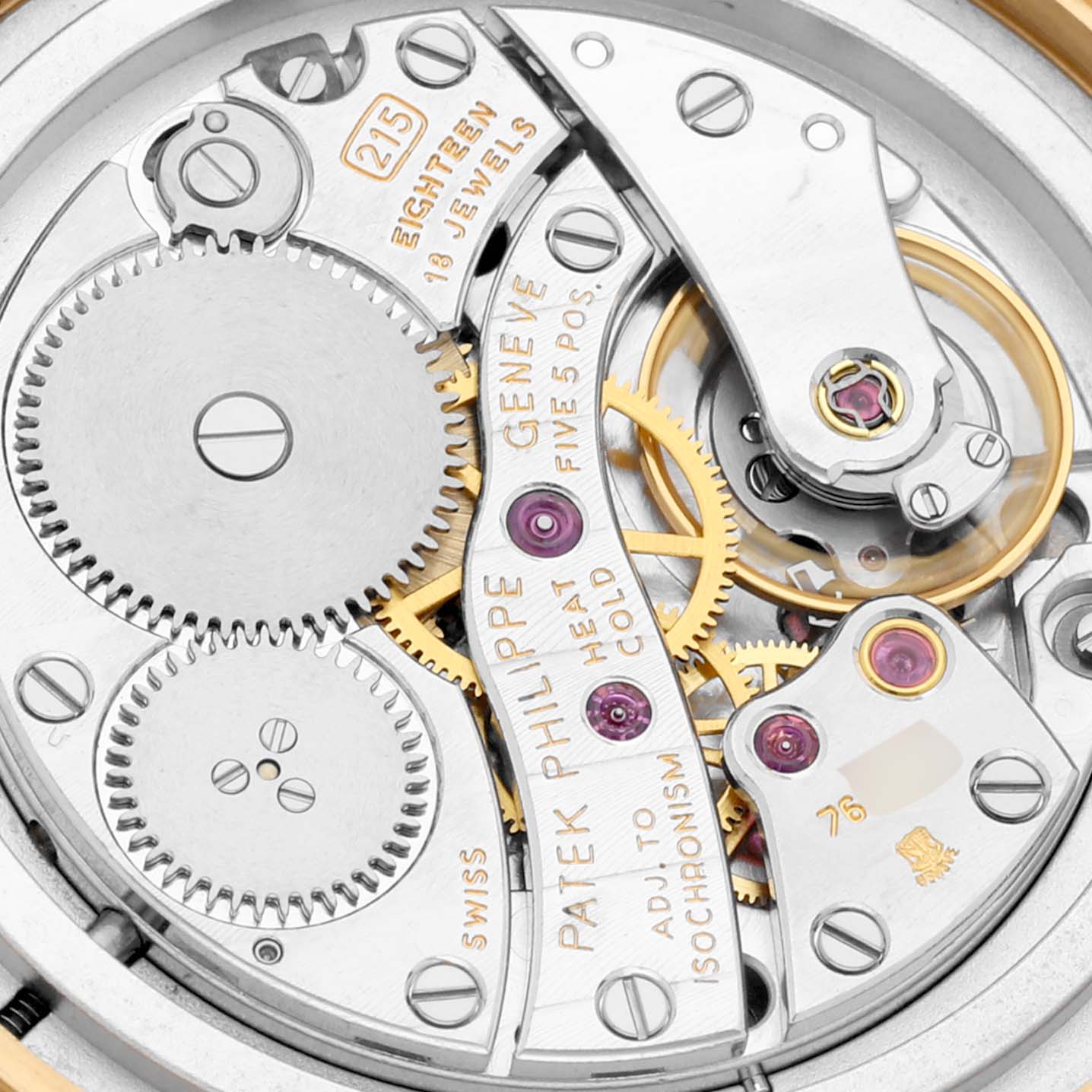 This image shows the intricate movement and inner workings of a Patek Philippe Calatrava 3960 Men's Yellow Gold Silver Dial 3960 Men's Yellow Gold Silver Dial watch.