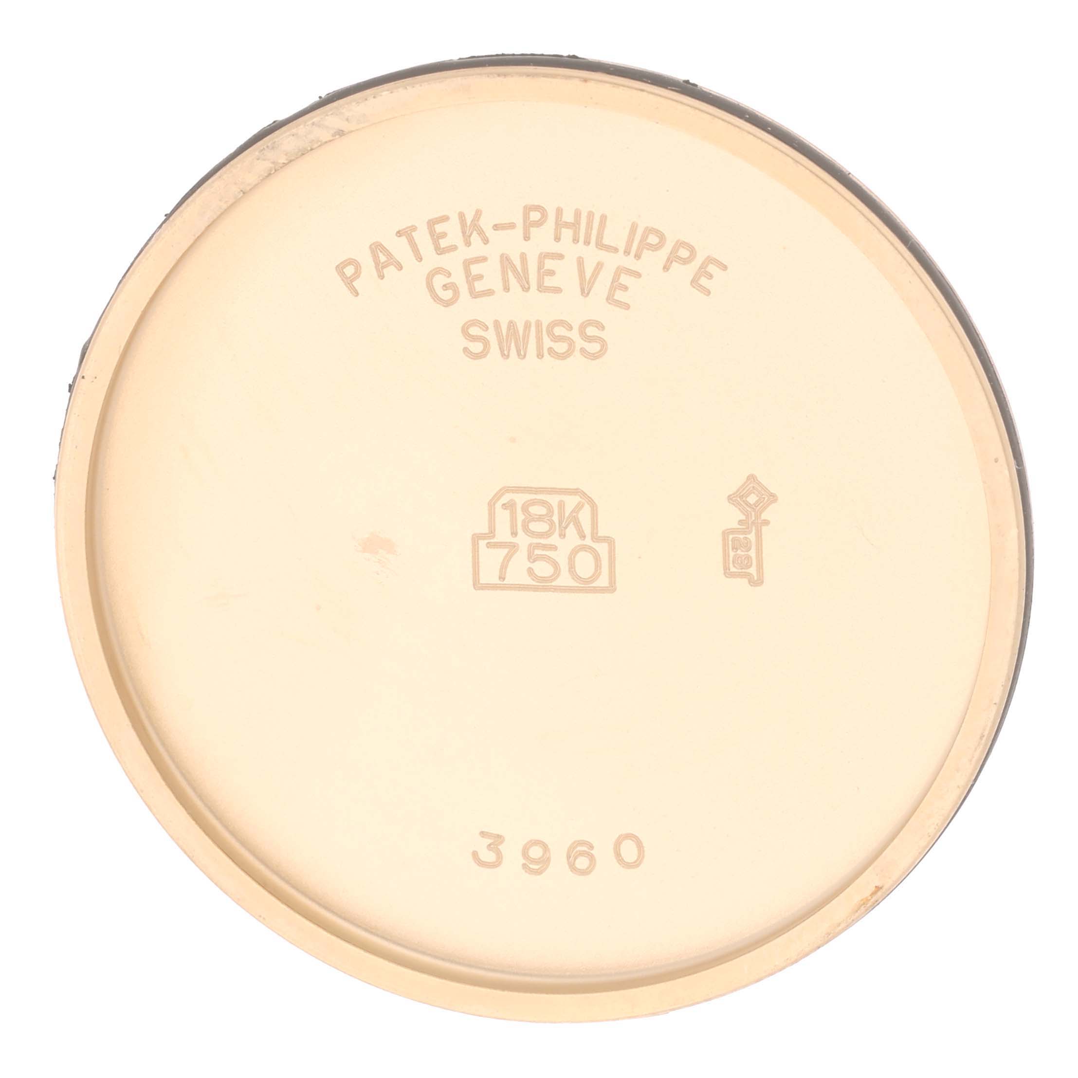 The image shows the interior side of the case back of a Patek Philippe Calatrava 3960 Men's Yellow Gold Silver Dial 3960 Men's Yellow Gold Silver Dial 3960 watch, marked with "PATEK-PHILIPPE GENEVE SWISS" and "18K 750".