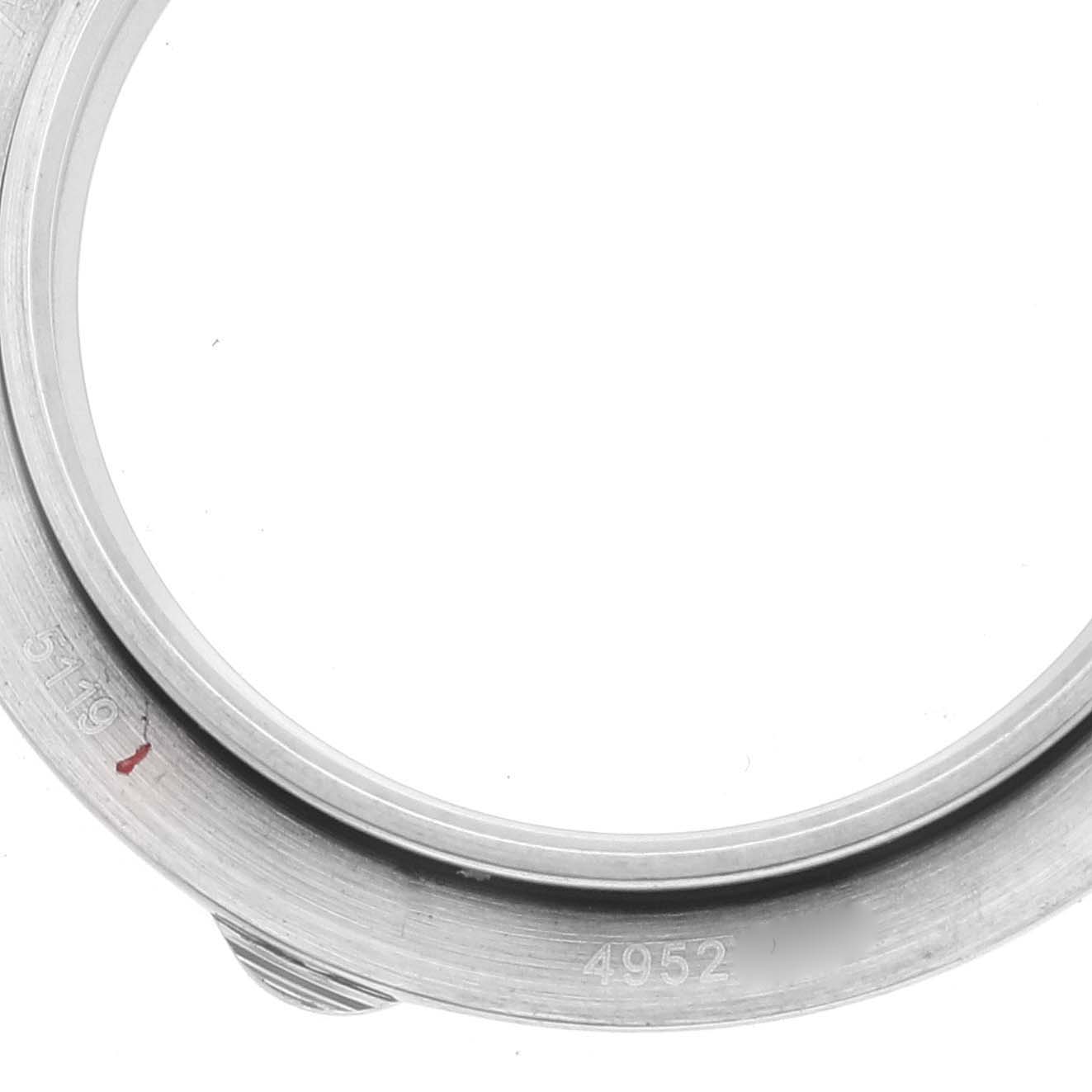 This image shows the inner case back and serial numbers of a Patek Philippe Calatrava 5119 Men's White Gold White Dial 5119 Men's White Gold White Dial watch from a close-up angle.