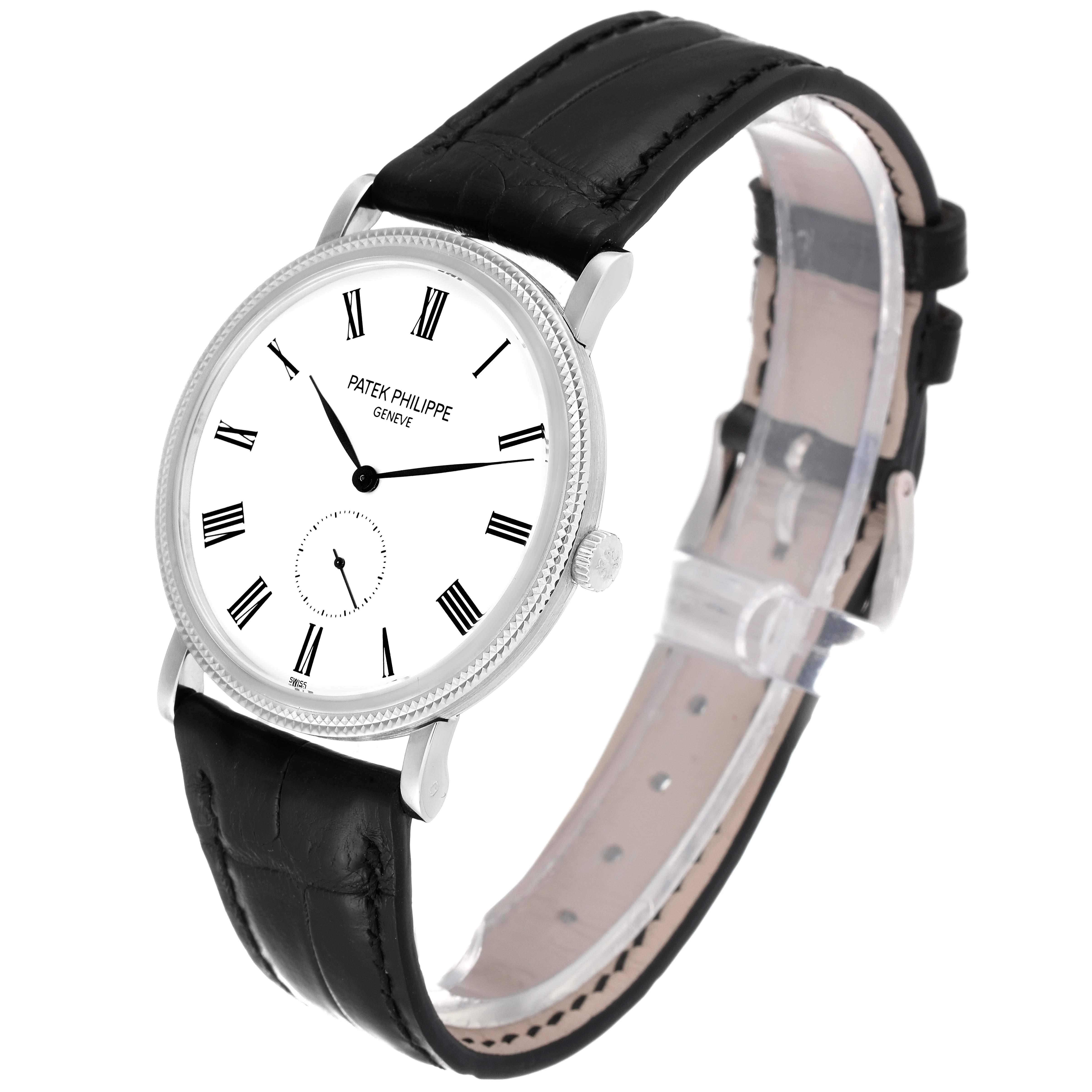The image shows a Patek Philippe Calatrava 5119 Men's White Gold White Dial 5119 Men's White Gold White Dial watch from an angled side view, displaying the face, crown, and leather strap.