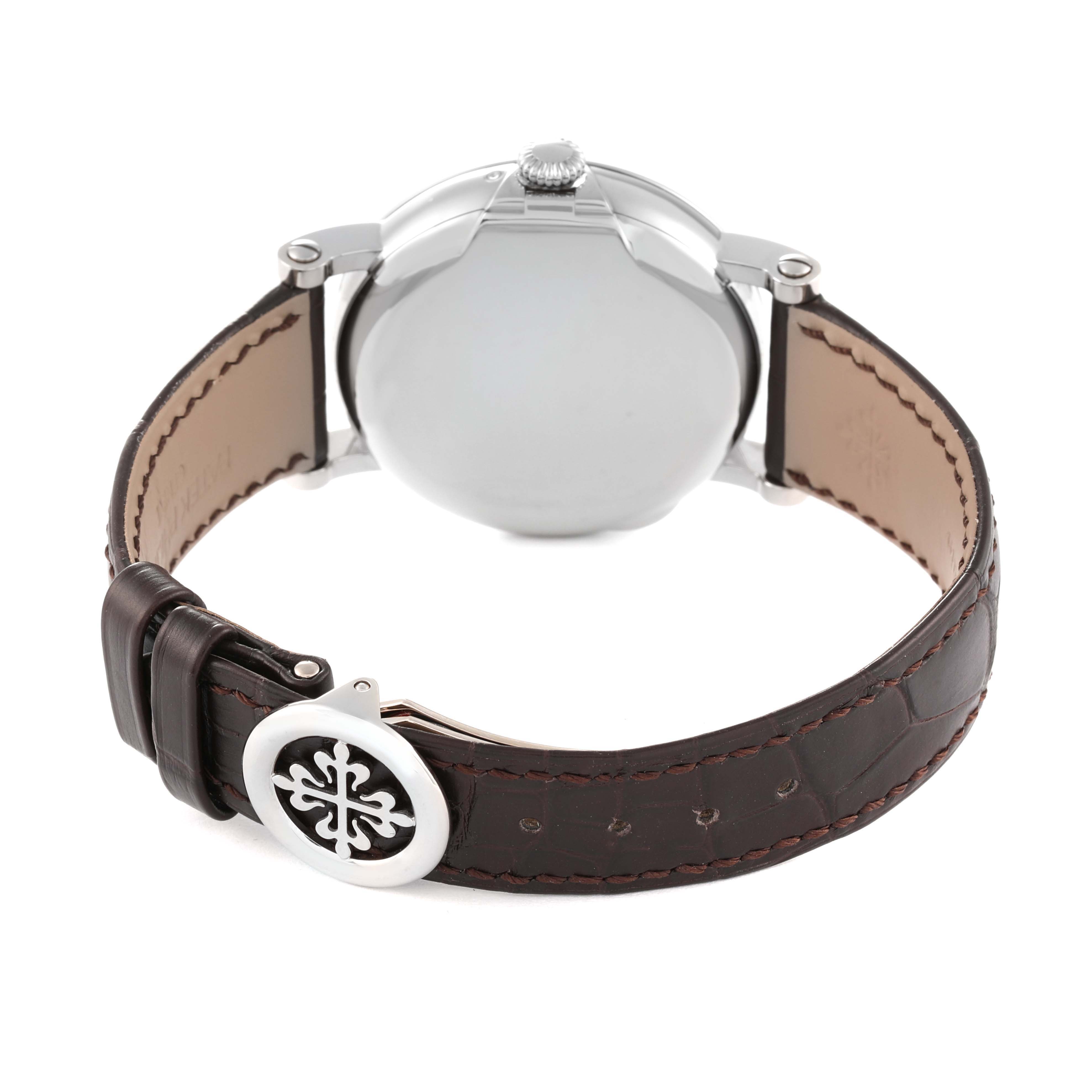 The image shows the back view of a Patek Philippe Complications 5159G-001 Men's White Gold Silver Dial 5159G-001 Men's White Gold Silver Dial model watch, focusing on the case back and leather strap.