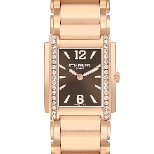The Patek Philippe Twenty-4 4910/1201R-001 Women's Rose Gold Brown Dial watch is shown from a front angle, displaying the rectangular face, diamond-set bezel, and metal bracelet.