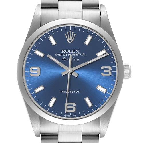 The image shows a front view of a Rolex Air-King watch, featuring a blue dial, silver hands, and a stainless steel bracelet.