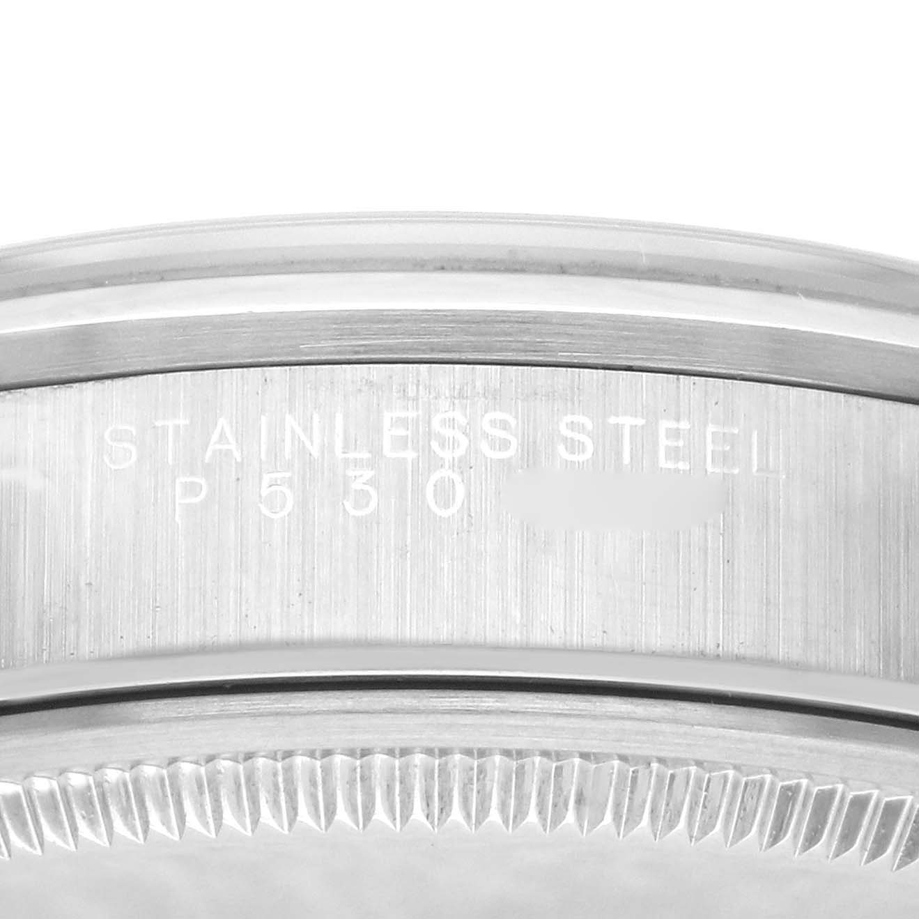 This image shows a close-up of the stainless steel case back of a Rolex Air-King 14000 Men's Stainless Steel Blue Dial 14000 Men's Stainless Steel Blue Dial watch, displaying the engraving.