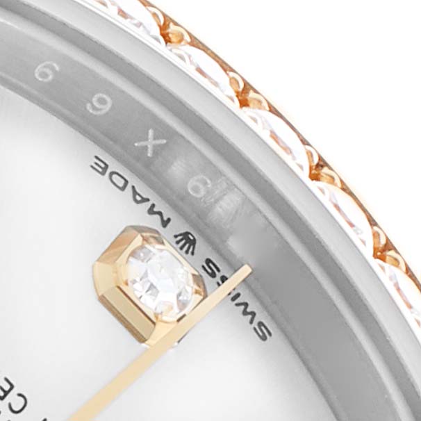 The image shows a close-up of the Rolex Datejust 278383RBR Women's Steel and Gold (two tone) Silver Dial's dial, featuring the edge with the "Swiss Made" marking and part of the bezel.