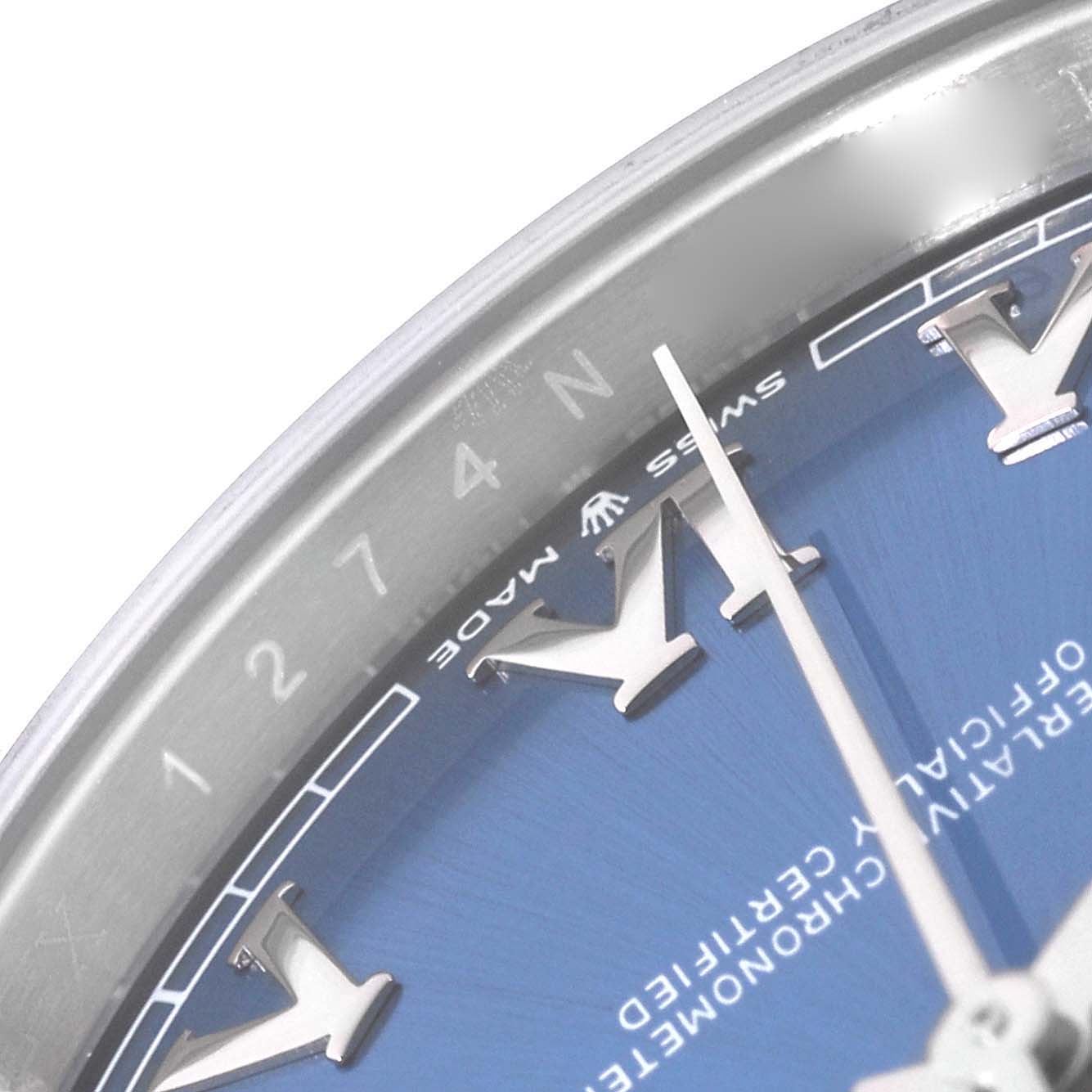 The image shows a close-up of the dial and bezel of a Rolex Datejust 41 126300 Men's Stainless Steel Blue Dial 126300 Men's Stainless Steel Blue Dial watch, focusing on the hour markers and hands.