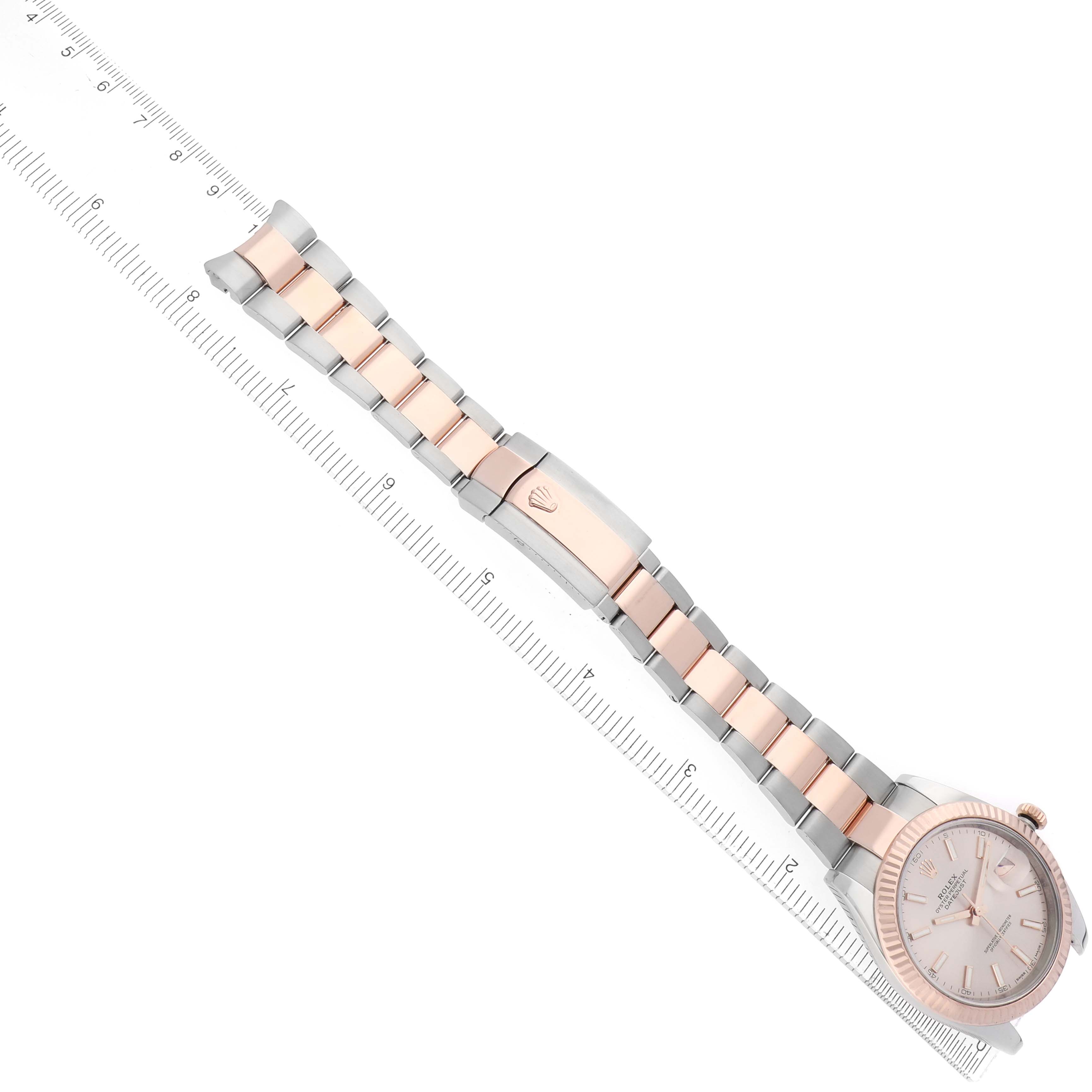 The Rolex Datejust 41 126331 Men
s Steel and Gold (two tone) Pink Dial is shown from an angled side view, highlighting the watch face, bracelet, and clasp.