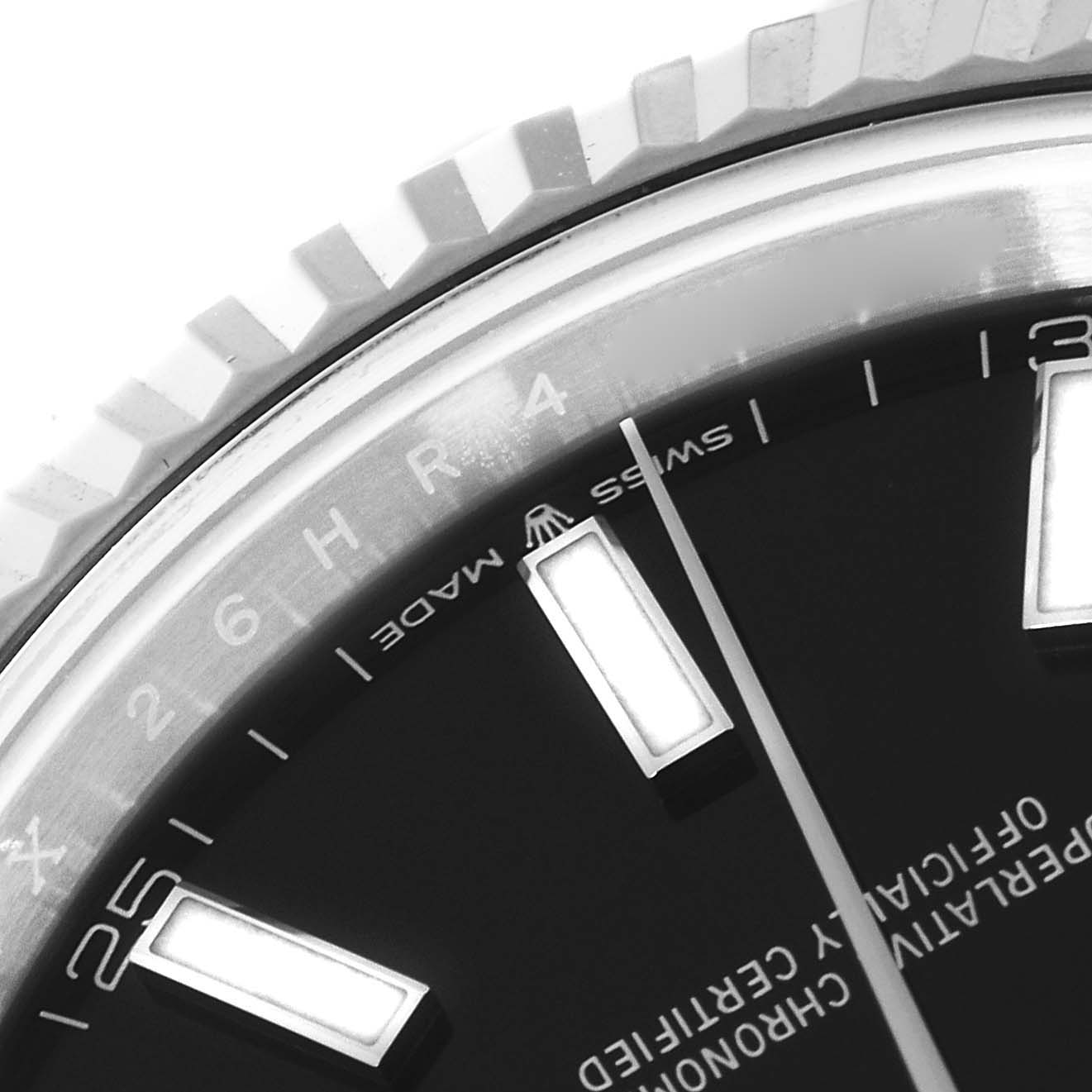 This image shows a close-up of the bezel and dial on a Rolex Datejust 41 126334 Men
s Stainless Steel Black Dial 126334 Men
s Stainless Steel Black Dial watch, highlighting the hour markers and "Swiss Made" text.