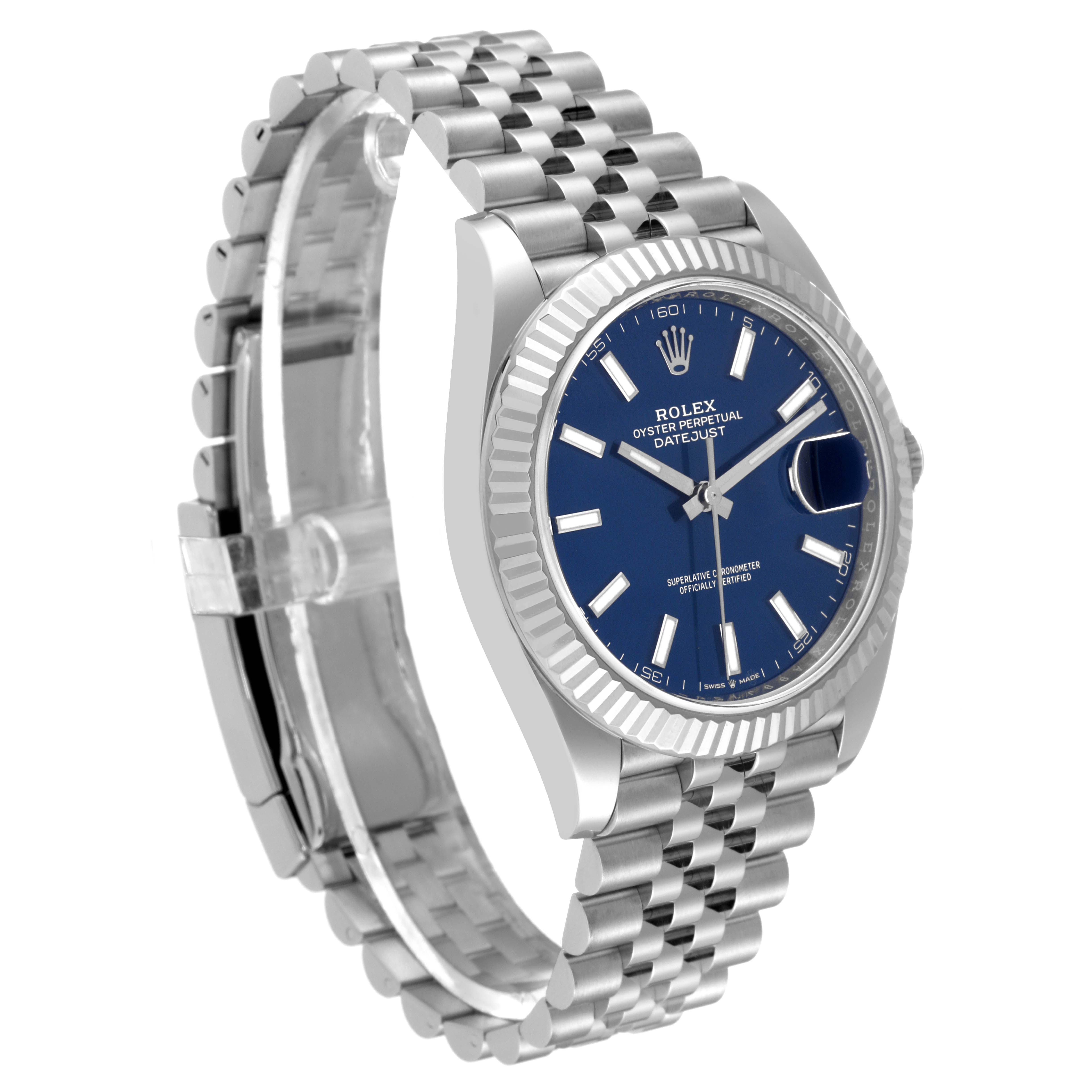 The Rolex Datejust 41 126334 Men
s Stainless Steel Blue Dial 126334 Men
s Stainless Steel Blue Dial watch is shown at an angled view displaying the face, bezel, and Jubilee bracelet.