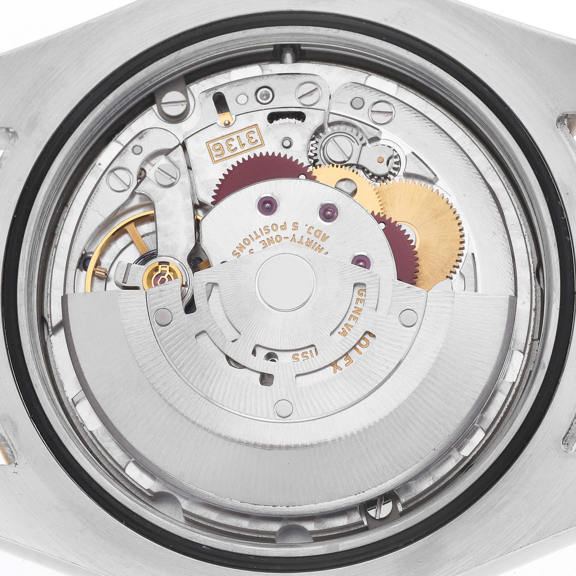 The image shows a close-up of the movement mechanism of a Rolex Datejust 41 116333 Men
s Steel and Gold (two tone) Black Dial watch from the back.