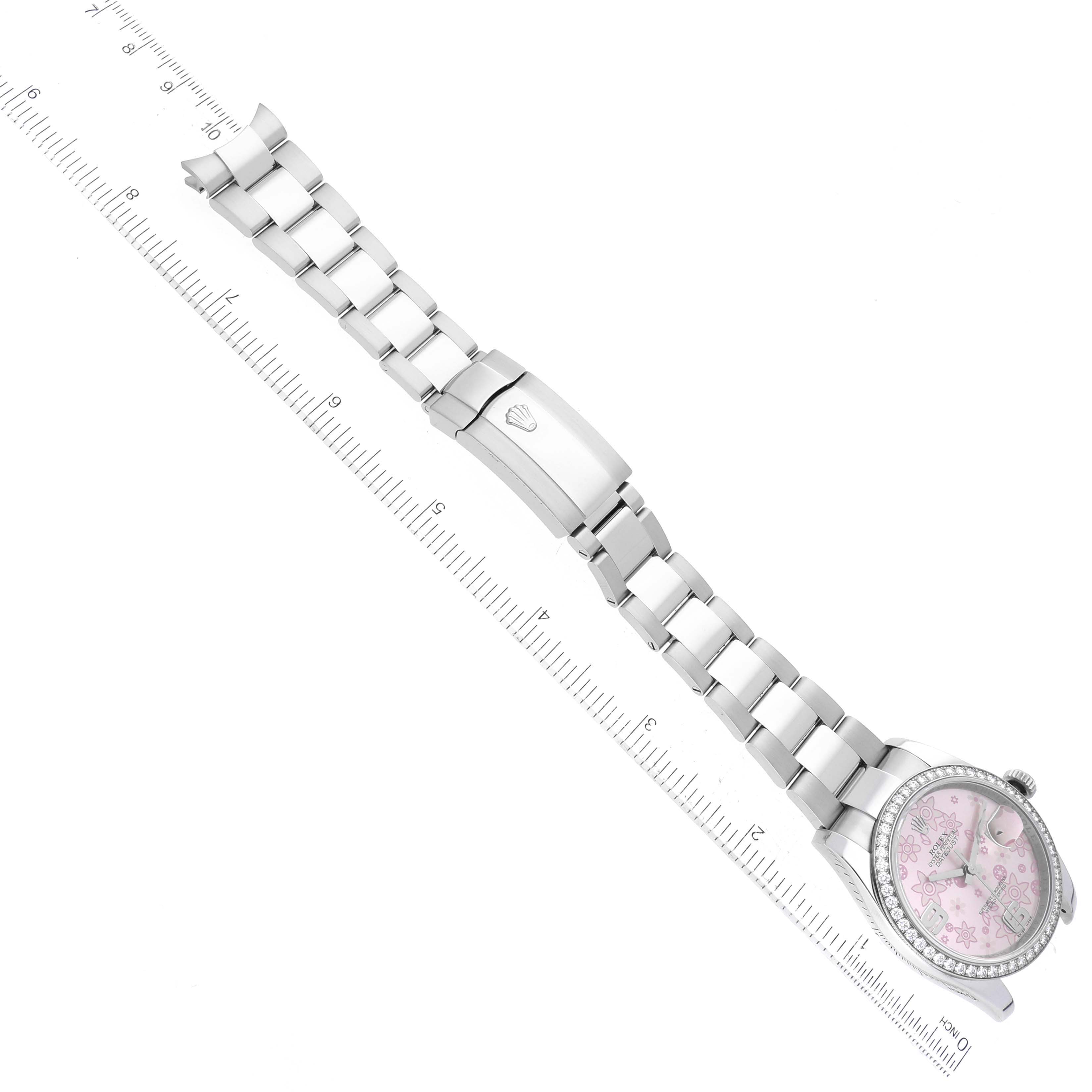 The image shows a Rolex Datejust 116244 Men's Steel and Gold (two tone) Pink Dial 116244 Men's Steel and Gold (two tone) Pink Dial watch, displaying the full metal bracelet, clasp, and partial face, aligned diagonally with a ruler.