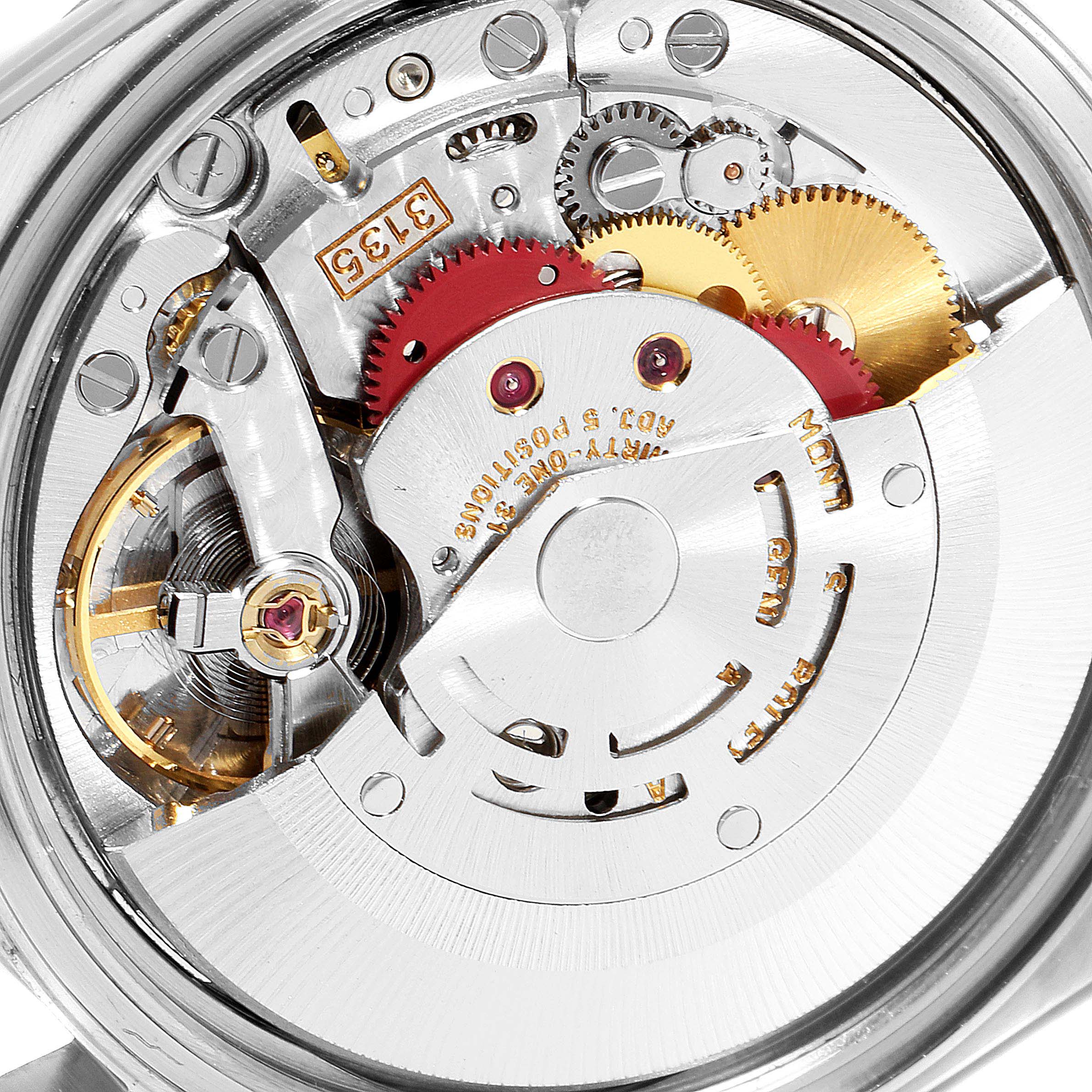 This image shows an up-close view of the internal mechanical movement of a Rolex Datejust 16233 Men
s Steel and Gold (two tone) Champagne Dial 16233 Men
s Steel and Gold (two tone) Champagne Dial watch.