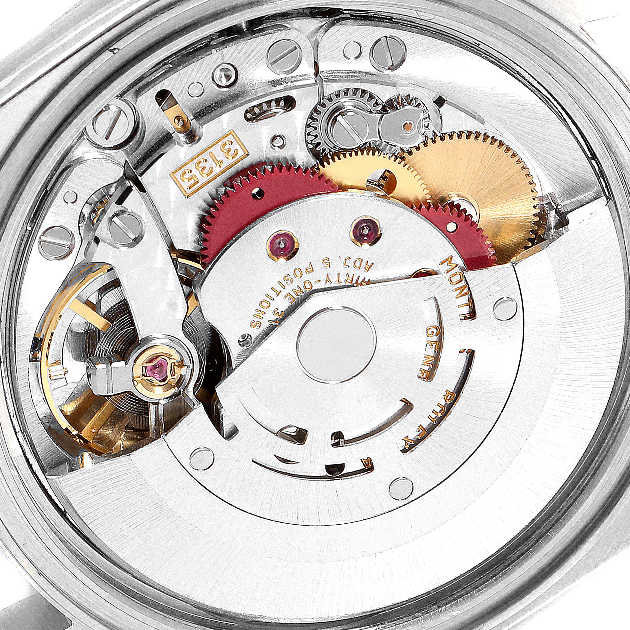 This image shows a close-up of the internal movement and mechanical parts of a Rolex Datejust 16233 Men
s Steel and Gold (two tone) Champagne Dial 16233 Men
s Steel and Gold (two tone) Champagne Dial watch.
