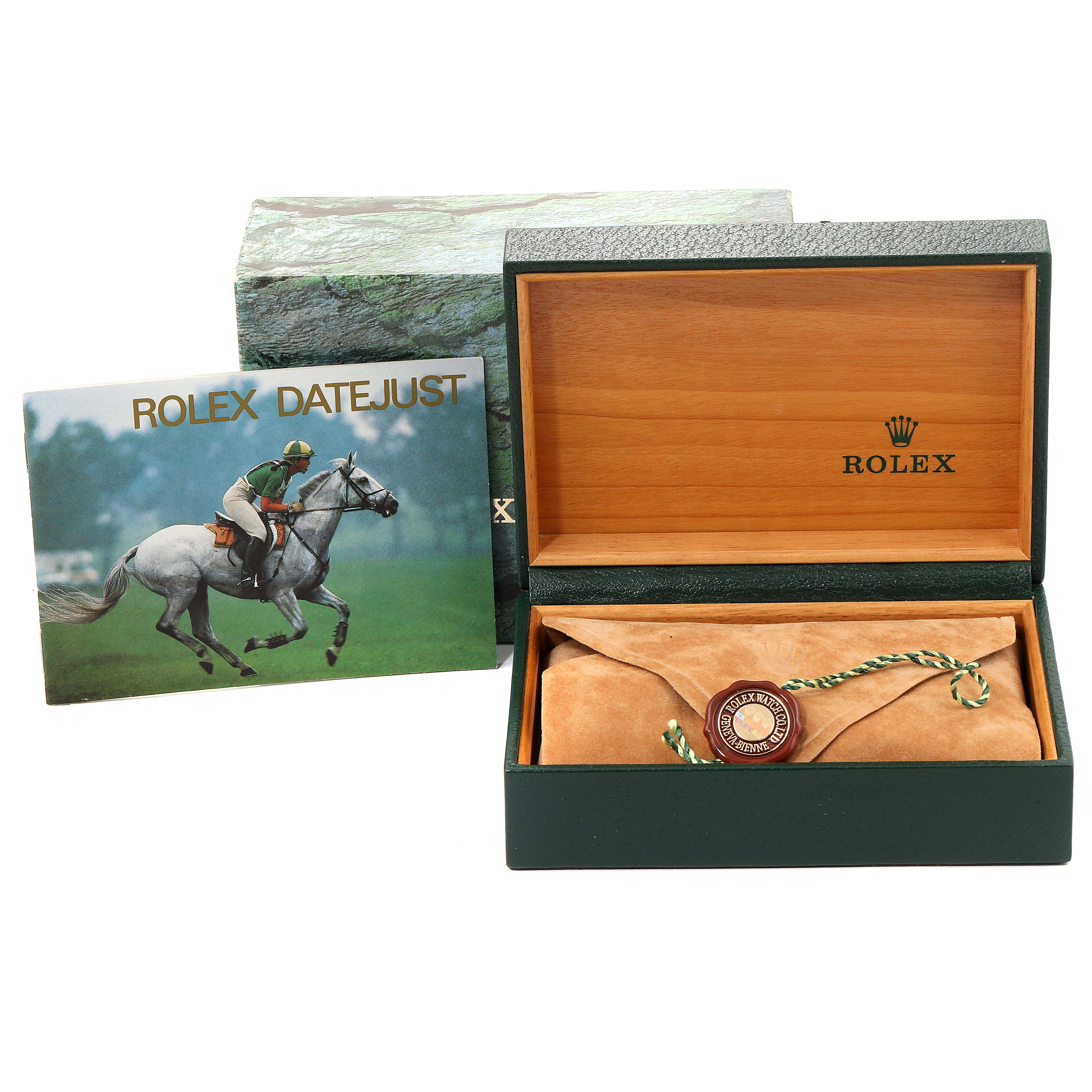 The image shows the packaging and accessories for a Rolex Datejust 16233 Men
s Steel and Gold (two tone) Champagne Dial 16233 Men
s Steel and Gold (two tone) Champagne Dial, including a box, tag, and booklet.