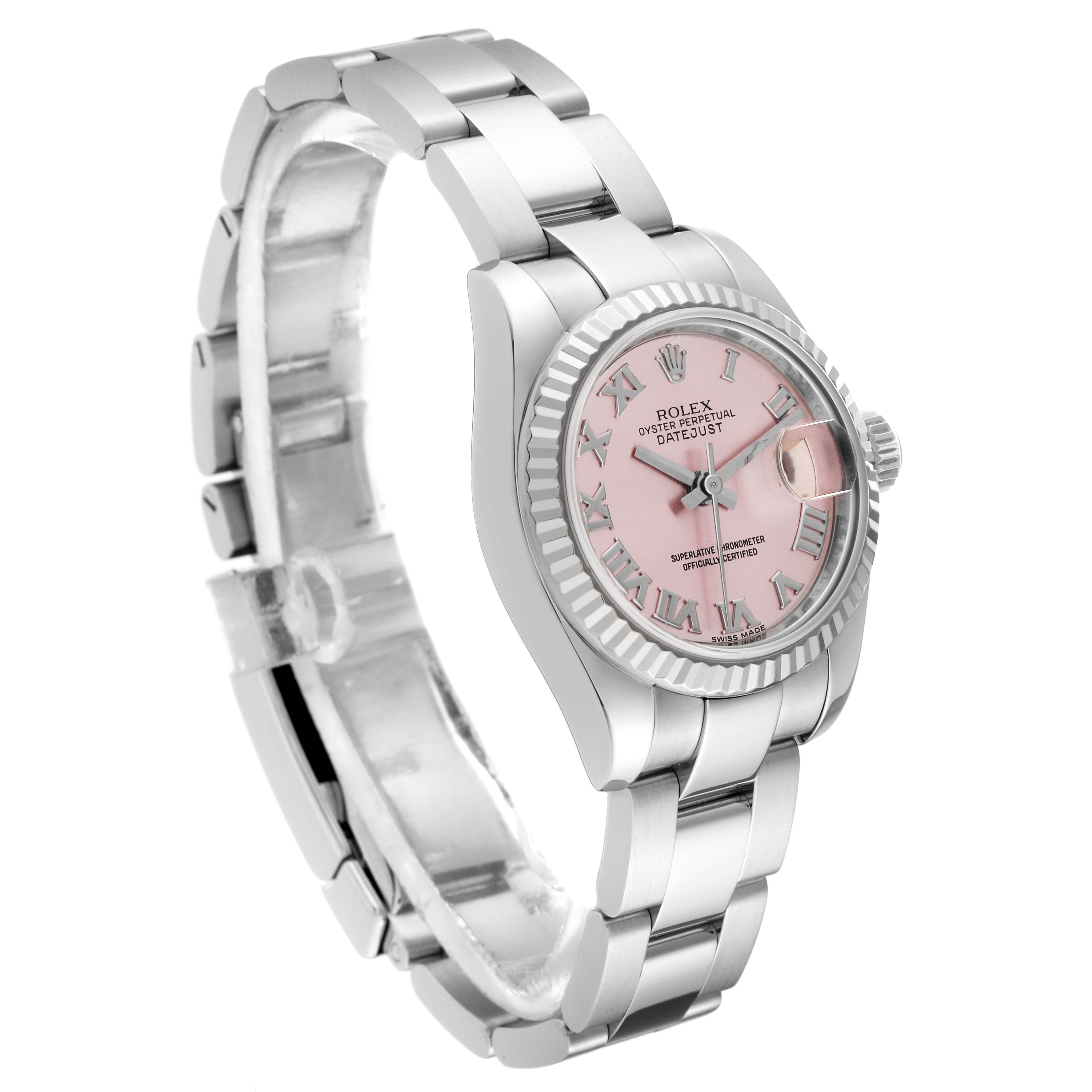 The Rolex Datejust 179174 Women's Stainless Steel Pink Dial 179174 Women's Stainless Steel Pink Dial watch is shown at a slight angle displaying its face and bracelet, highlighting the pink dial and Roman numerals.