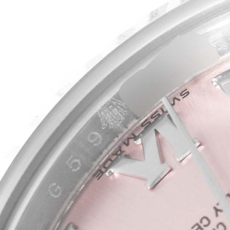 The image shows a close-up of the dial edge and bezel of a Rolex Datejust 179174 Women's Stainless Steel Pink Dial 179174 Women's Stainless Steel Pink Dial watch.