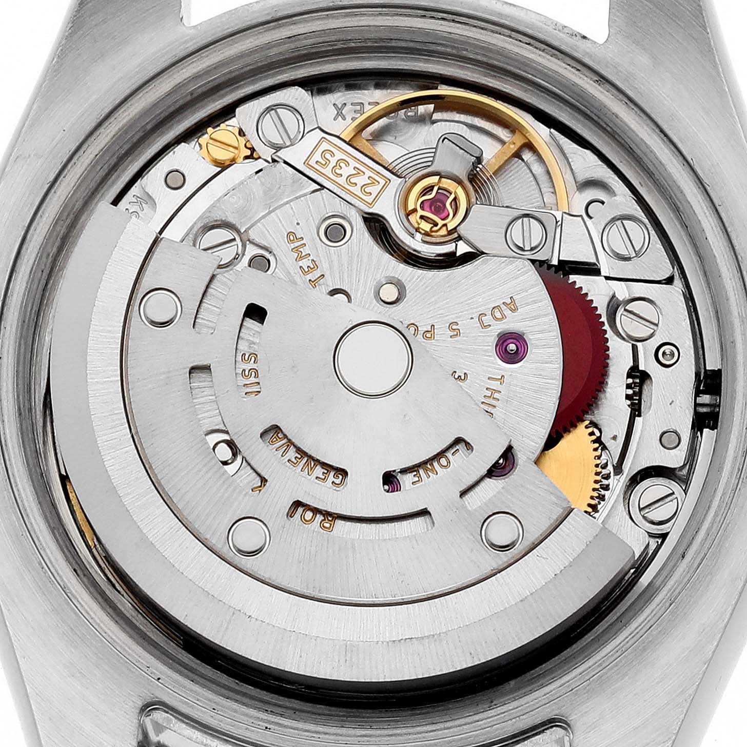 The image shows the movement of a Rolex Datejust 179174 Women's Stainless Steel Pink Dial 179174 Women's Stainless Steel Pink Dial watch from a rear angle, highlighting its intricate mechanical components.