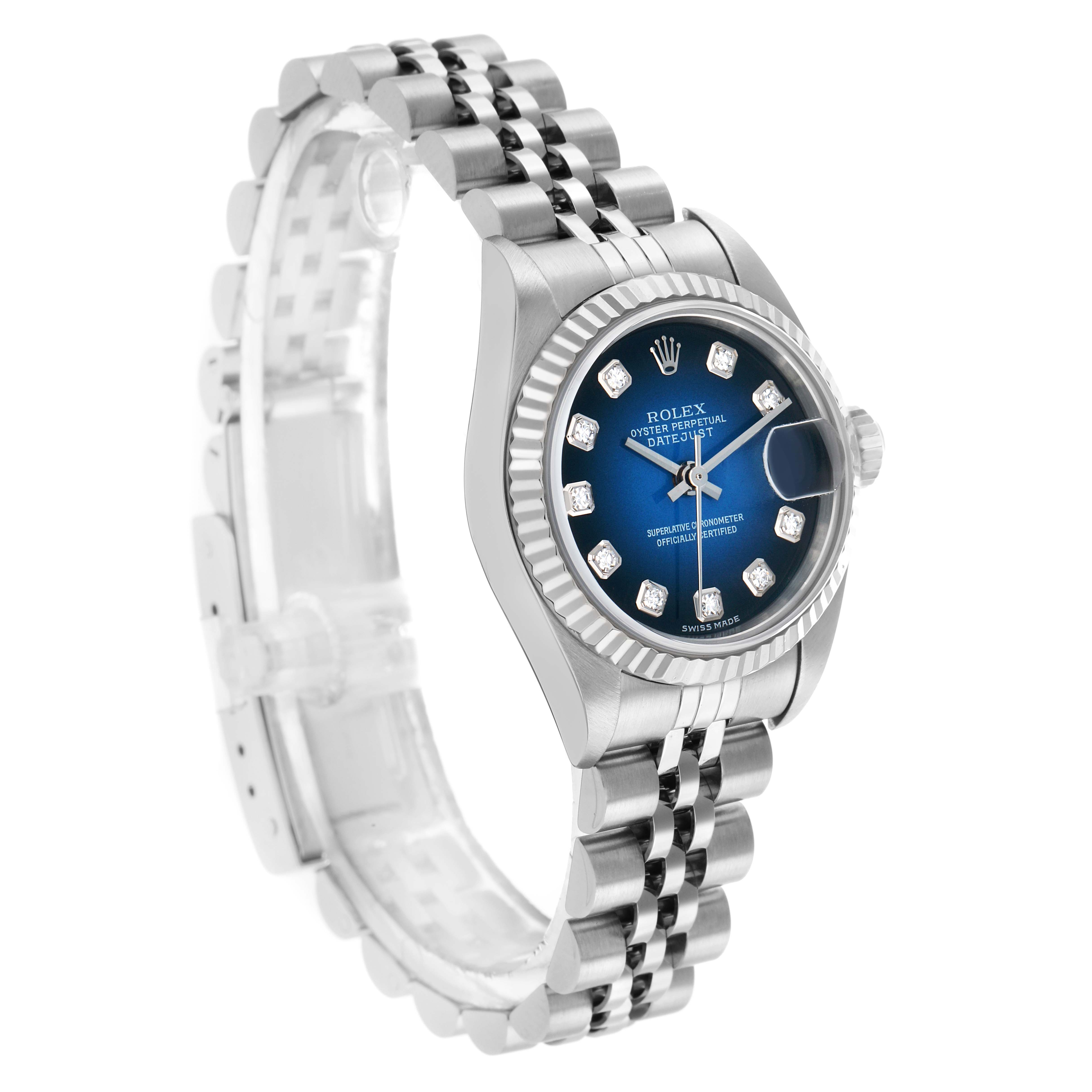 The Rolex Datejust 79174 Women's Stainless Steel Blue Dial watch is shown at an angled view, displaying its face, fluted bezel, bracelet, and crown.