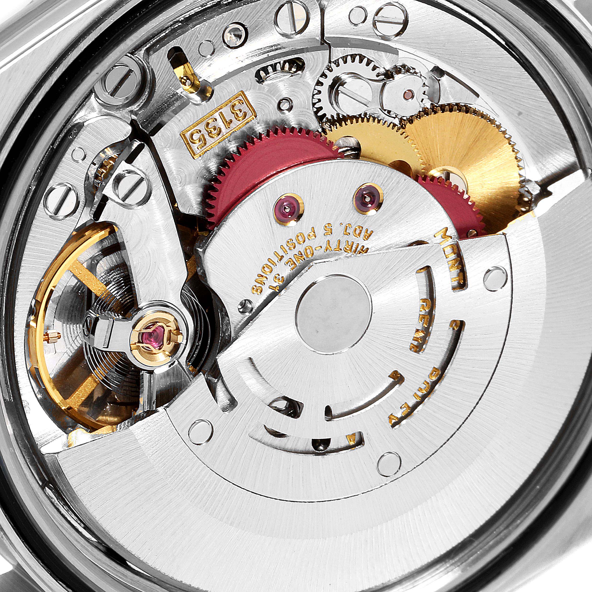 The image showcases the internal movement mechanism of a Rolex Datejust 16233 Men's Steel and Gold (two tone) Blue Dial 16233 Men's Steel and Gold (two tone) Blue Dial watch at a close-up angle.