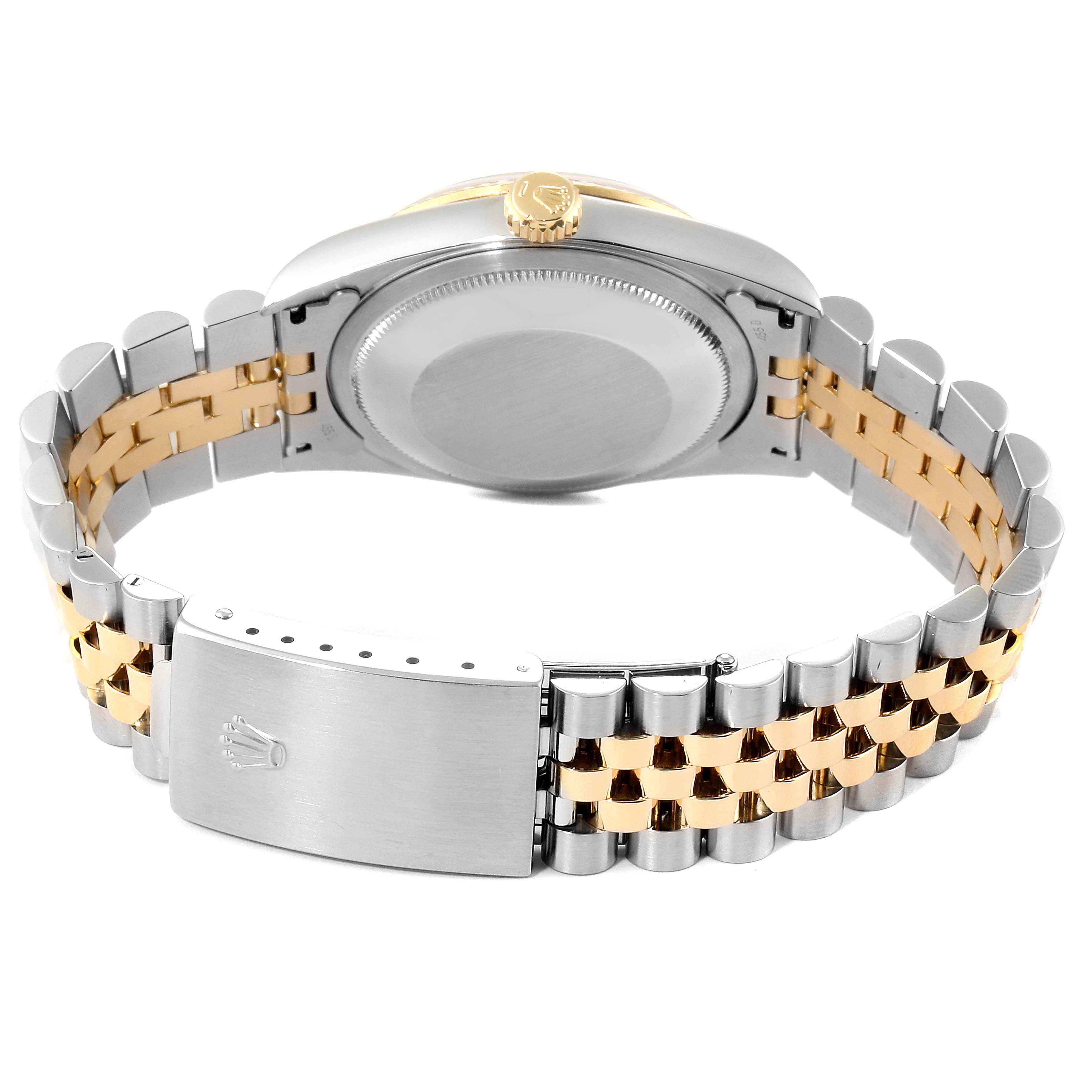 This image shows the back case and bracelet of the Rolex Datejust 16233 Men's Steel and Gold (two tone) Blue Dial 16233 Men's Steel and Gold (two tone) Blue Dial watch, highlighting the gold and silver jubilee band and clasp.