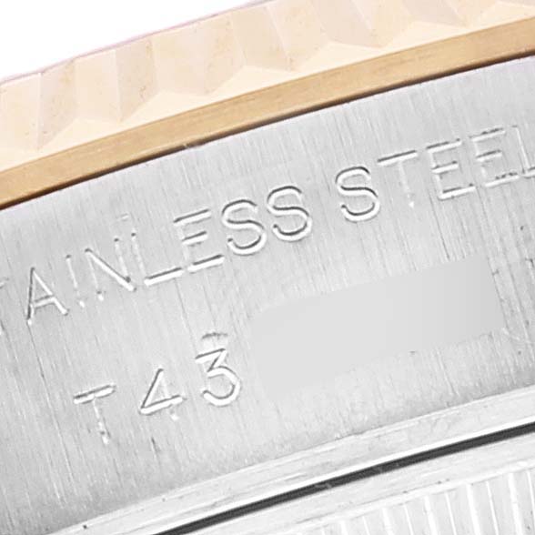 This image shows a close-up of the side and bezel of a Rolex Datejust 69173 Women's Steel and Gold (two tone) Champagne Dial 69173 Women's Steel and Gold (two tone) Champagne Dial watch, highlighting the stainless steel material.