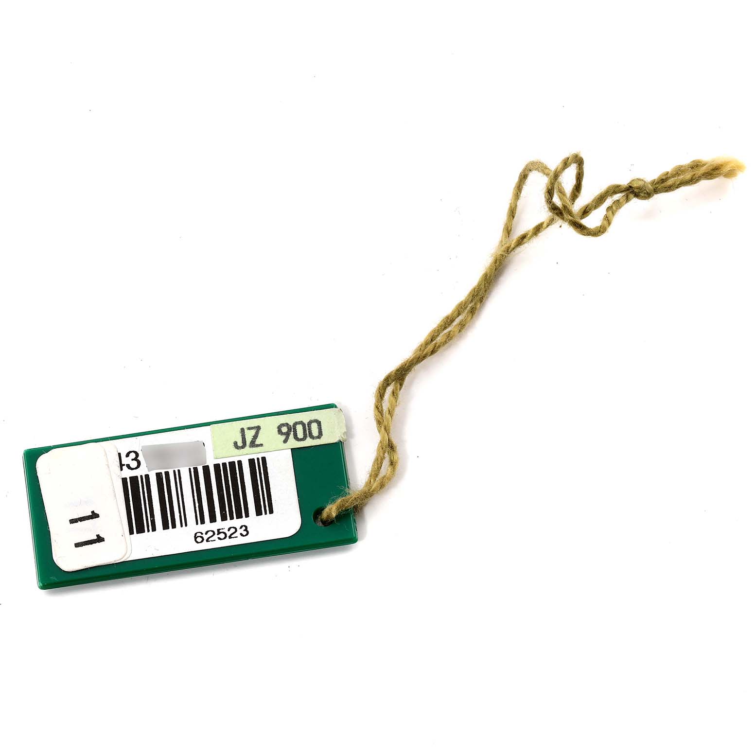 This image shows a green tag with a string, typically found on Rolex Datejust 69173 Women's Steel and Gold (two tone) Champagne Dial 69173 Women's Steel and Gold (two tone) Champagne Dial watches and watch accessories.