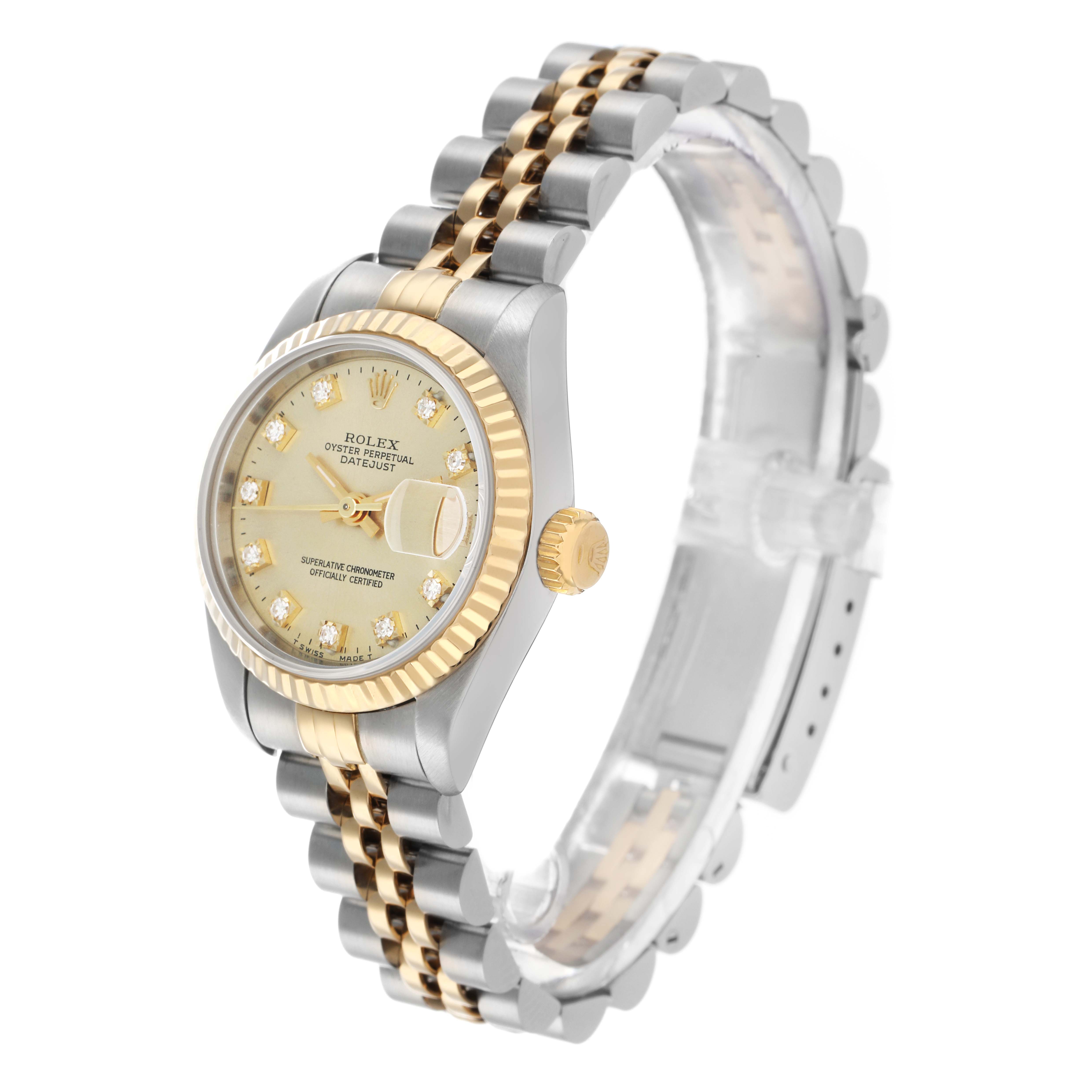 The image shows a Rolex Datejust 69173 Women's Steel and Gold (two tone) Champagne Dial watch at a three-quarter angle, highlighting the face, bezel, crown, and bracelet.