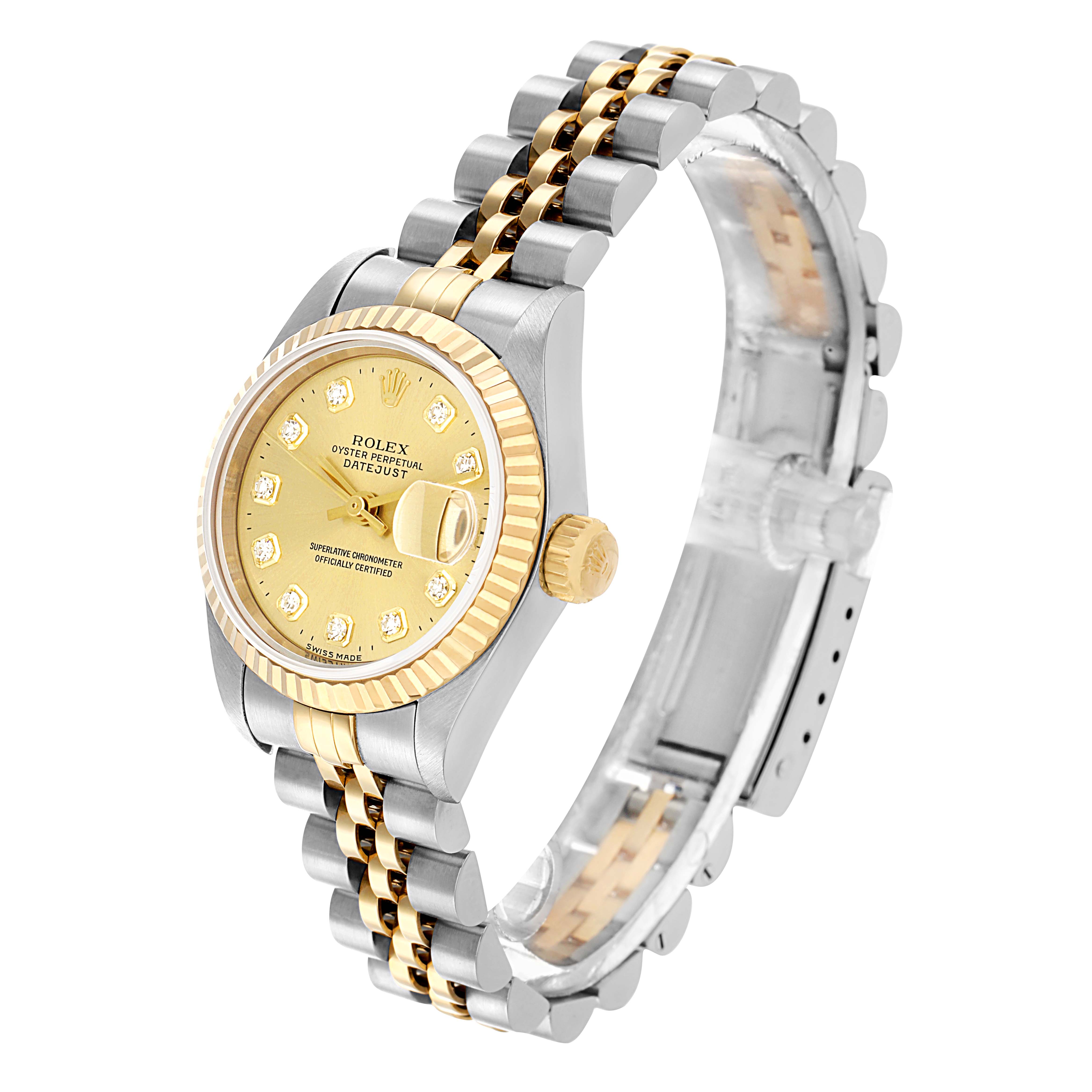 The Rolex Datejust 69173 Women's Steel and Gold (two tone) Champagne Dial watch is shown at a three-quarter angle, highlighting the dial, bezel, crown, and two-tone bracelet.