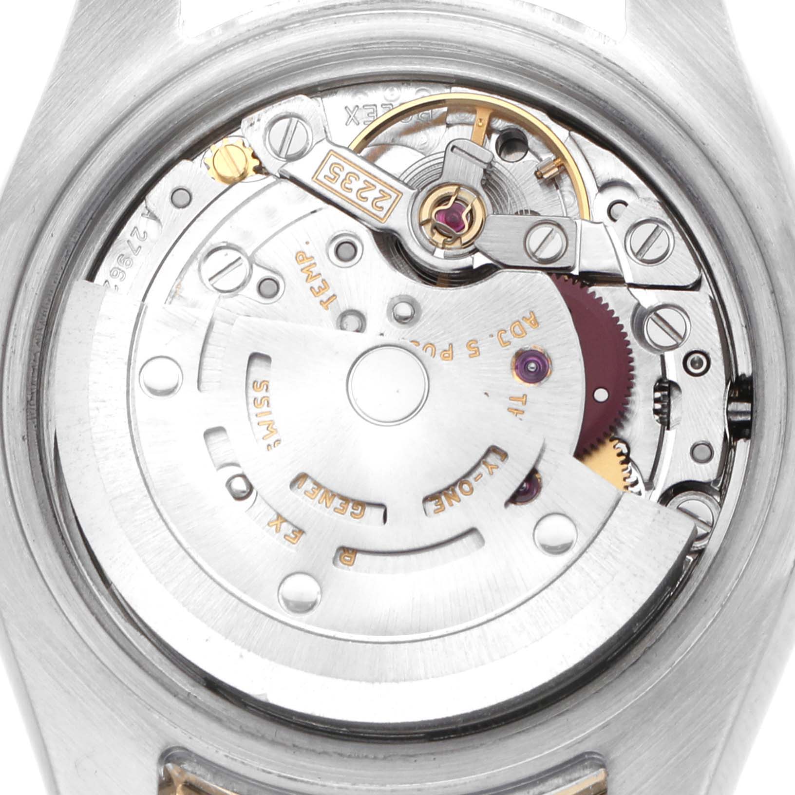 The image shows the movement mechanism of a Rolex Datejust 179313 Women's Steel and Gold (two tone) Champagne Dial watch from a rear angle, highlighting its intricate components.
