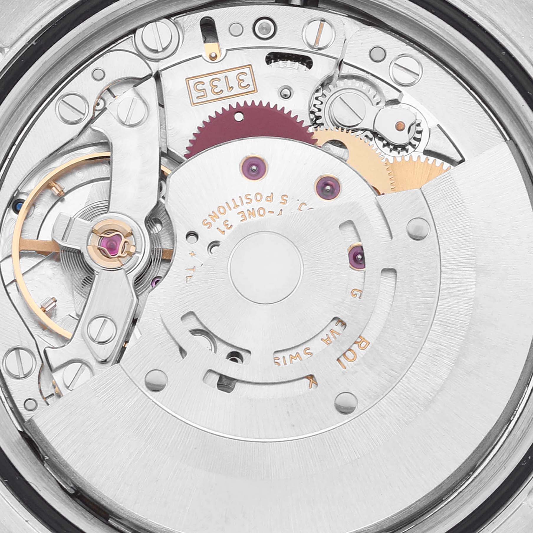 This is a close-up of the inner mechanical movement of a Rolex Datejust 116233 Men's Steel and Gold (two tone) White Dial 116233 Men's Steel and Gold (two tone) White Dial watch.