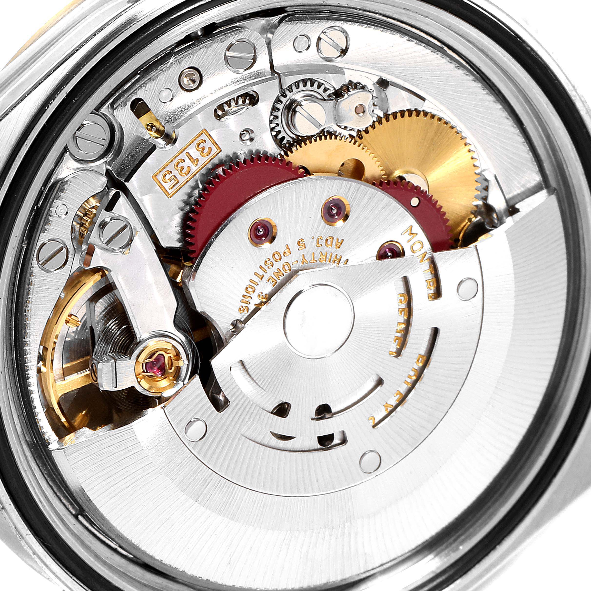 The image shows the movement and internal components of a Rolex Datejust 16233 Men
s Steel and Gold (two tone) White Dial 16233 Men
s Steel and Gold (two tone) White Dial watch from a close-up angle.