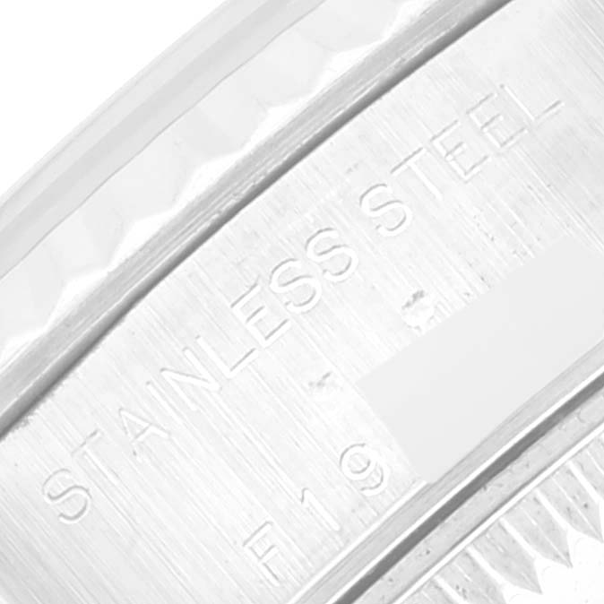 The image shows a close-up of the side of a Rolex Datejust 79174 Women's Stainless Steel White Dial 79174 Women's Stainless Steel White Dial watch, highlighting its stainless steel material.