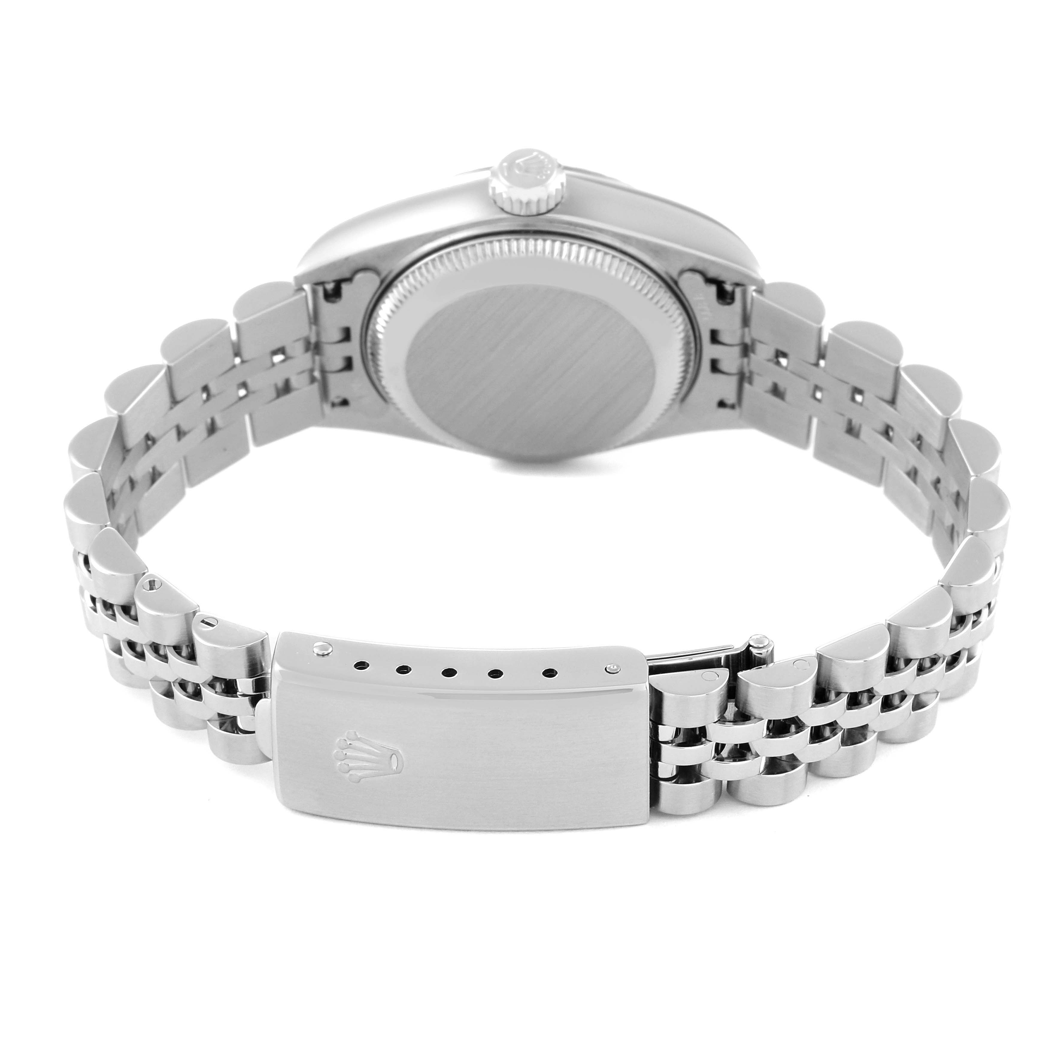 The image shows the back of a Rolex Datejust 79174 Women's Stainless Steel White Dial 79174 Women's Stainless Steel White Dial watch, highlighting the case back, crown, and Jubilee bracelet with the clasp open.