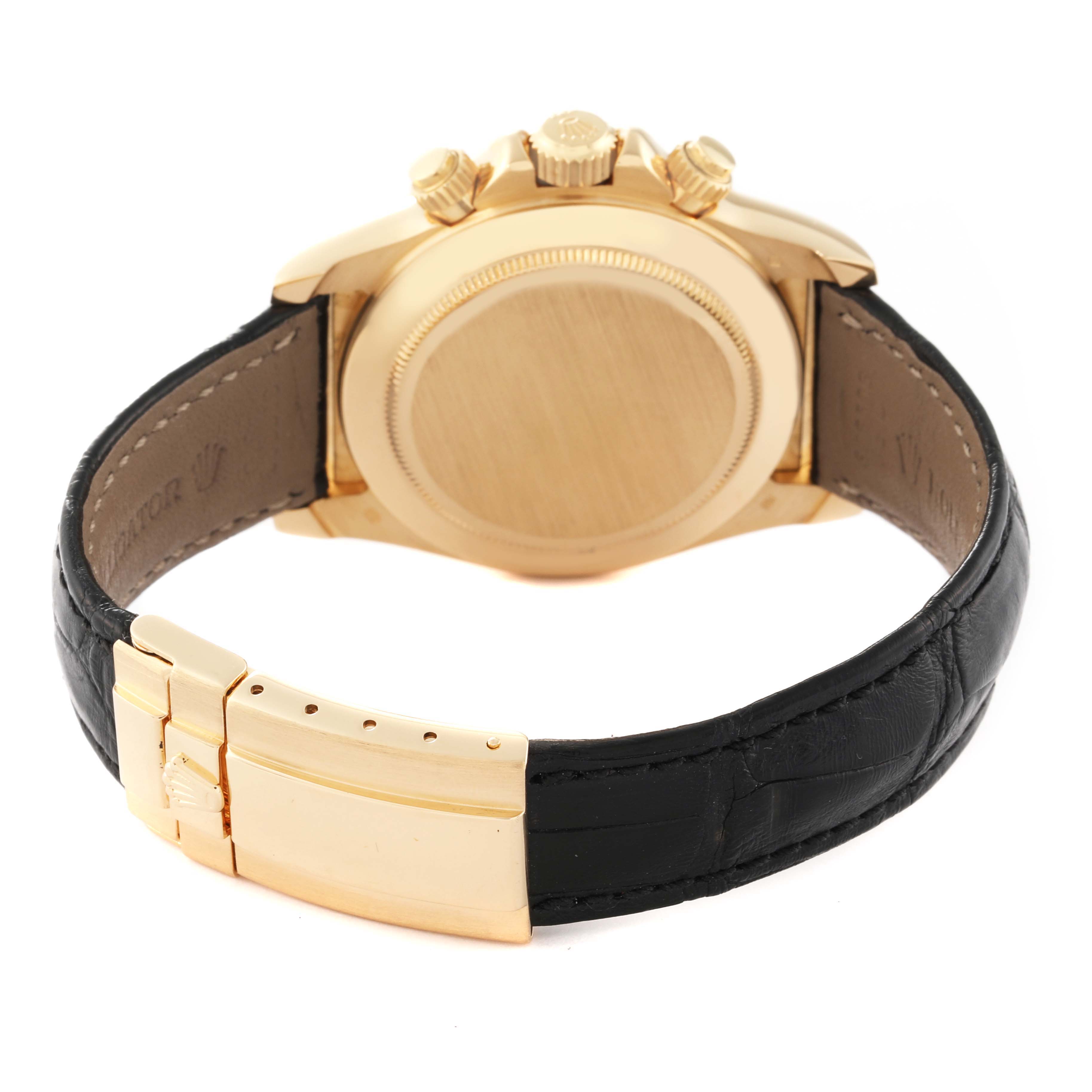 This image shows the back view of a Rolex Daytona 16518 Men's Yellow Gold Black Dial 16518 Men's Yellow Gold Black Dial watch, highlighting the case back, crown, push buttons, and leather strap with clasp.