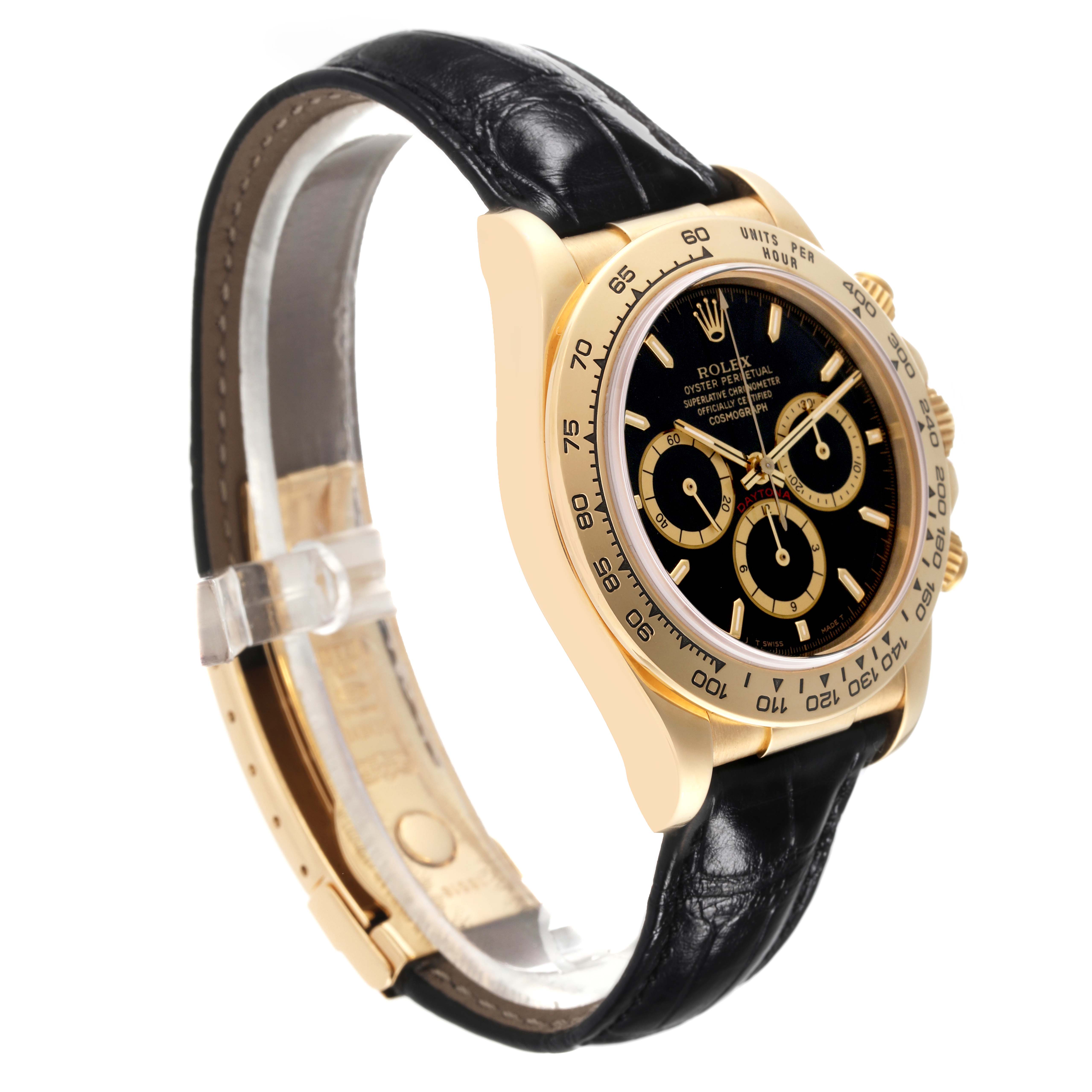The Rolex Daytona 16518 Men's Yellow Gold Black Dial 16518 Men's Yellow Gold Black Dial watch is shown at a slight angle, featuring a black dial, gold casing, and black leather strap.