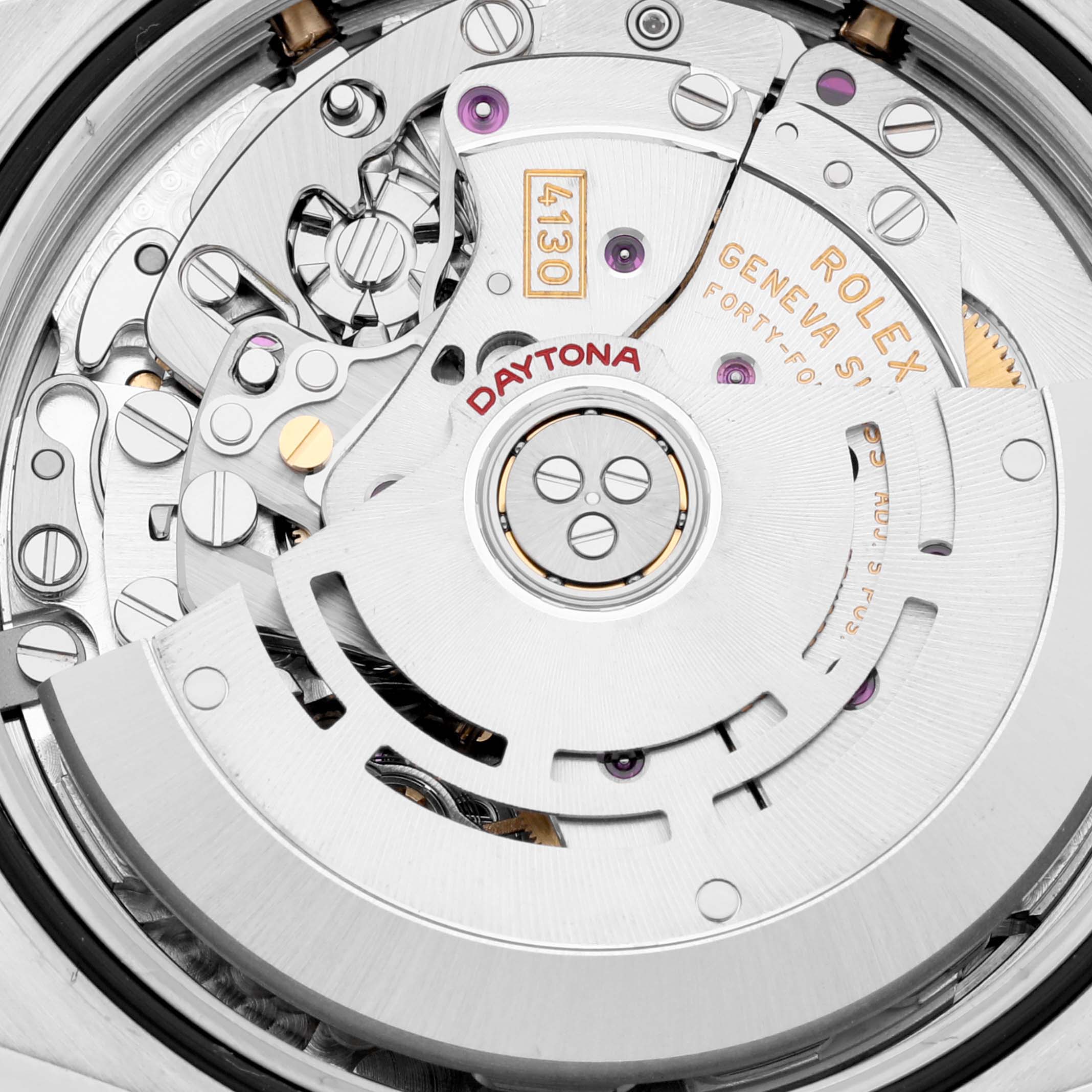 This image shows the movement of a Rolex Daytona 116523 Men's Steel and Gold (two tone) Black Dial 116523 Men's Steel and Gold (two tone) Black Dial watch from a close-up angle, highlighting the rotor and intricate components.