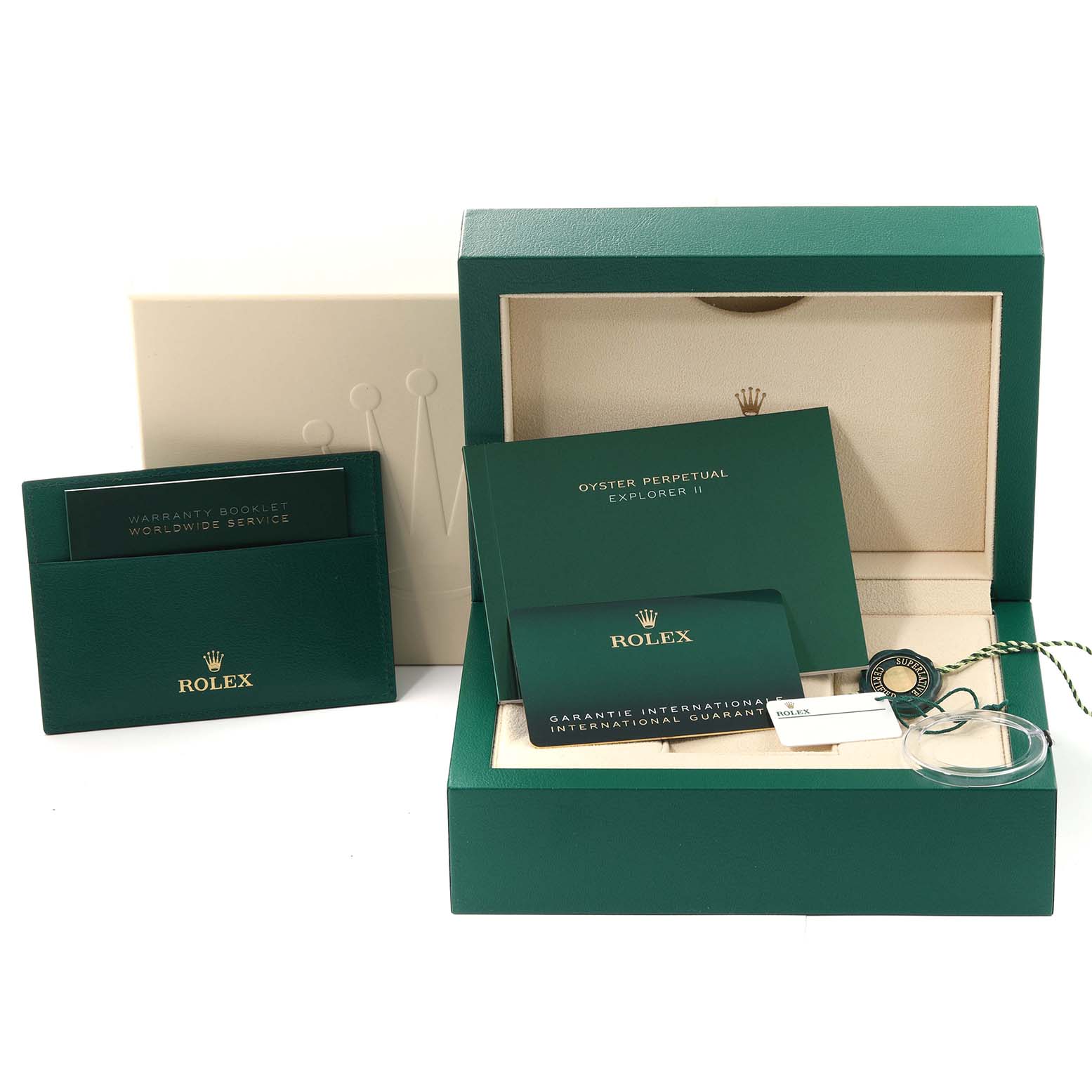 The image shows the packaging, warranty booklet, and manuals for a Rolex Explorer 226570 Men's Stainless Steel White Dial 226570 Men's Stainless Steel White Dial watch.