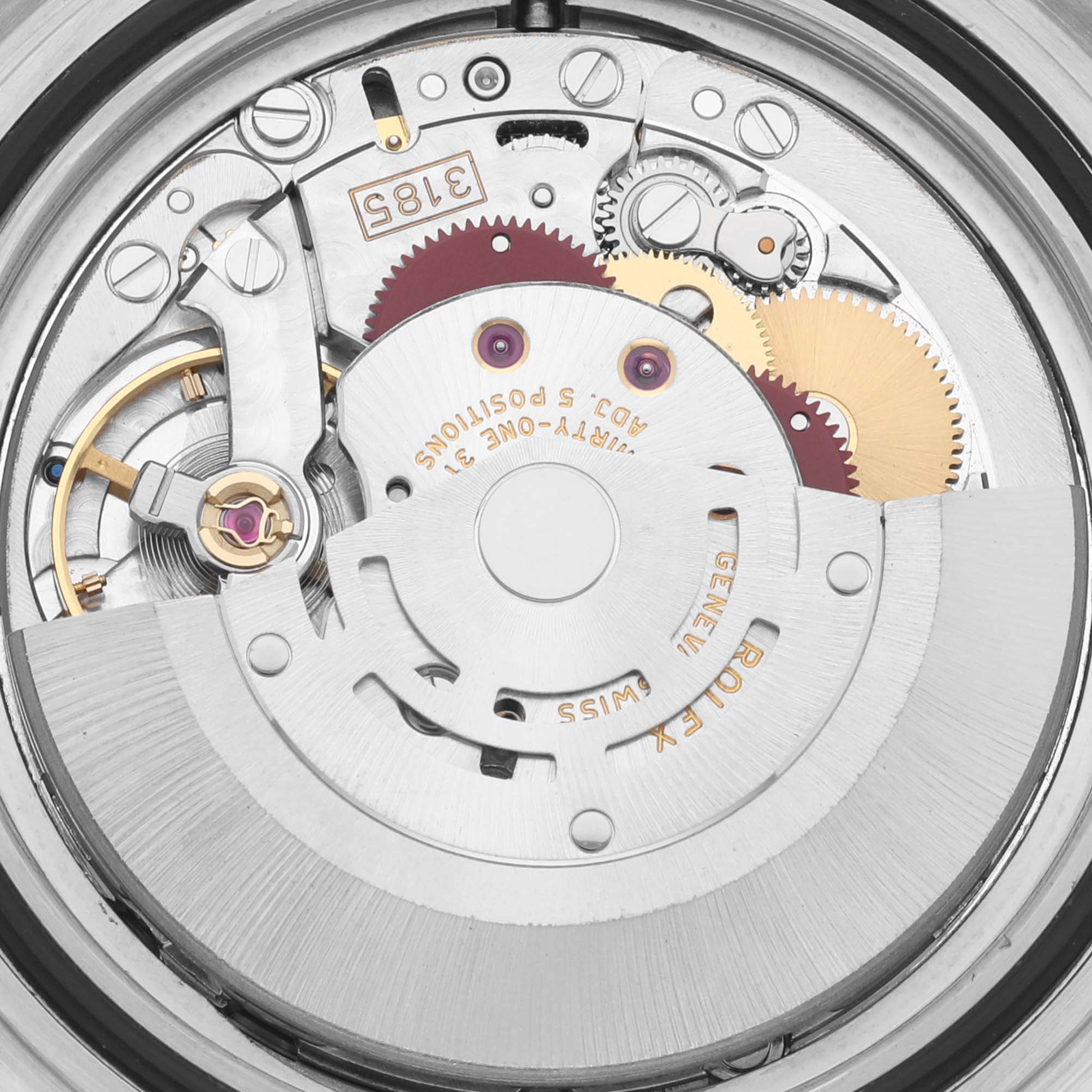 The image shows a close-up view of the Rolex Explorer 16570 Men's Stainless Steel White Dial 16570 Men's Stainless Steel White Dial watch movement, highlighting its intricate gears and components.