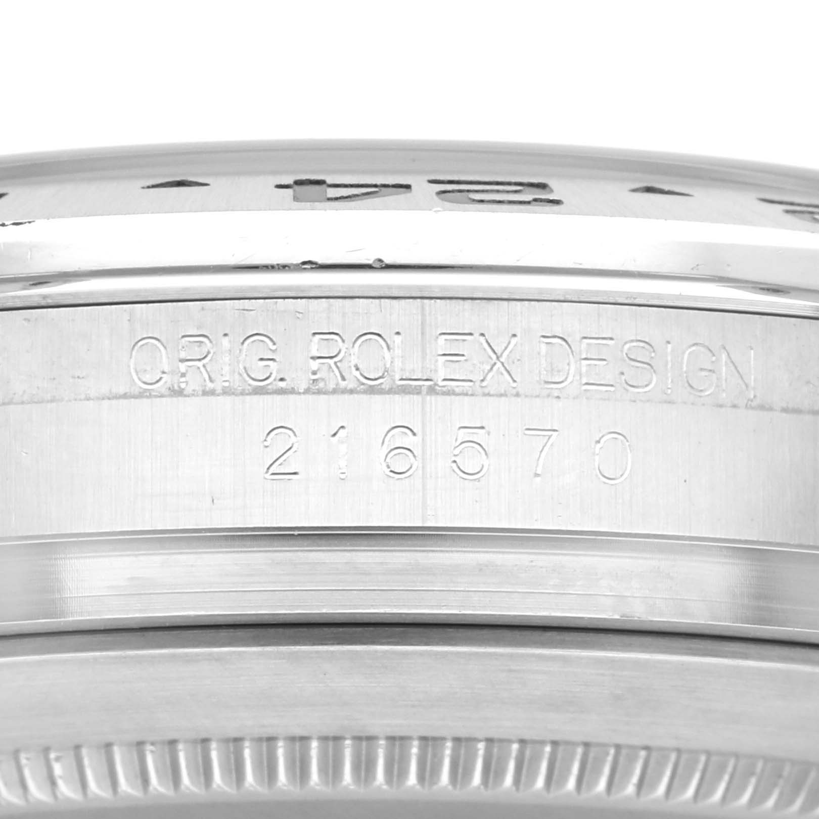 The image shows a close-up angle of the side of the Rolex Explorer 216570 Men's Stainless Steel White Dial 216570 Men's Stainless Steel White Dial model watch, highlighting its model number "216570" and original design engraving.