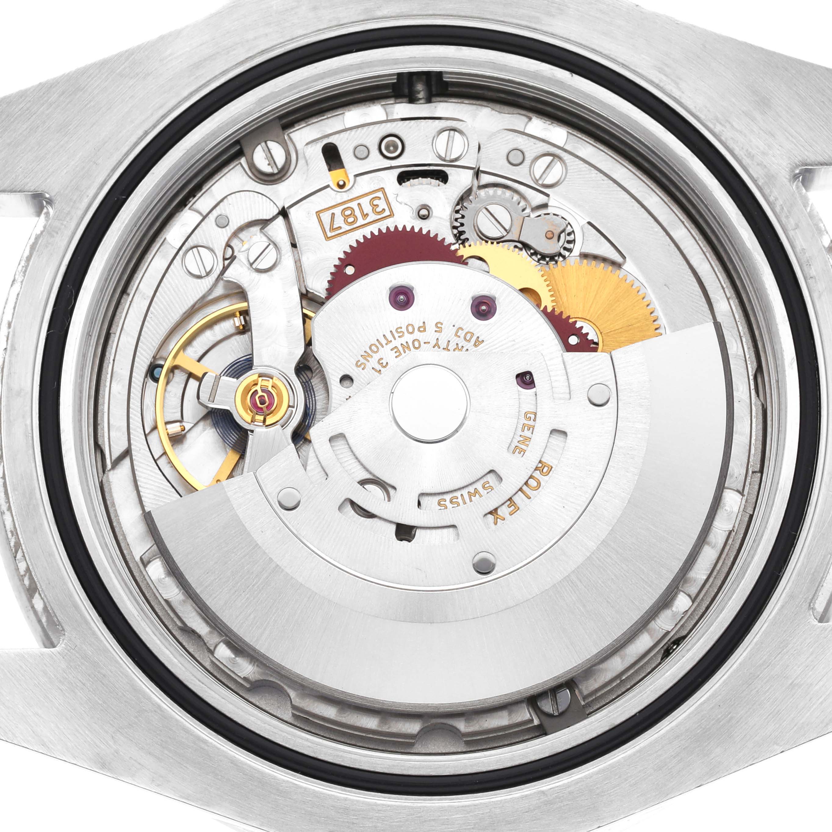 This image shows the internal mechanical movement of a Rolex Explorer 216570 Men's Stainless Steel White Dial 216570 Men's Stainless Steel White Dial watch from a back view with its intricate gears and components.