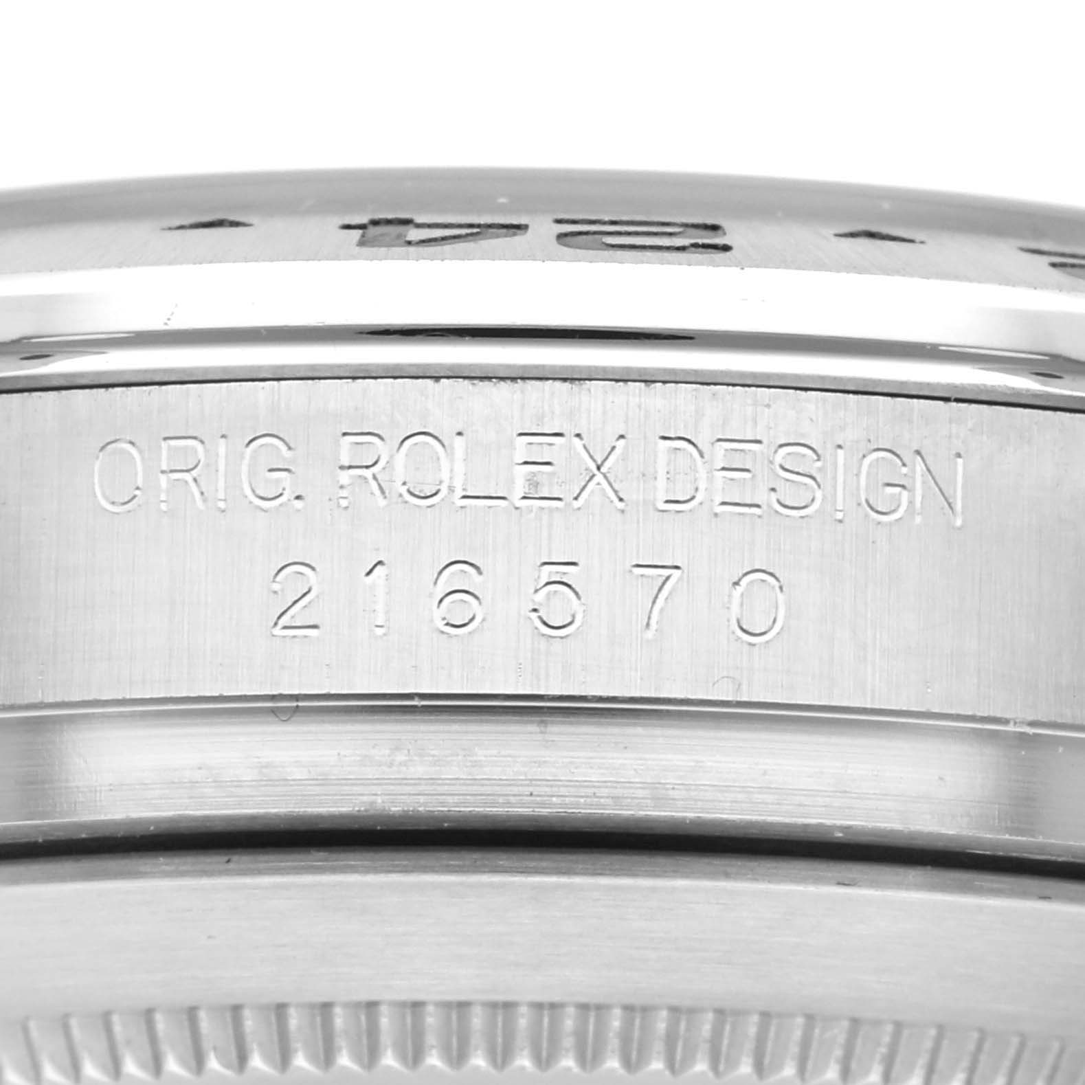 This image shows a close-up side view of the bezel and serial number area of the Rolex Explorer 216570 Men's Stainless Steel White Dial 216570 Men's Stainless Steel White Dial model.