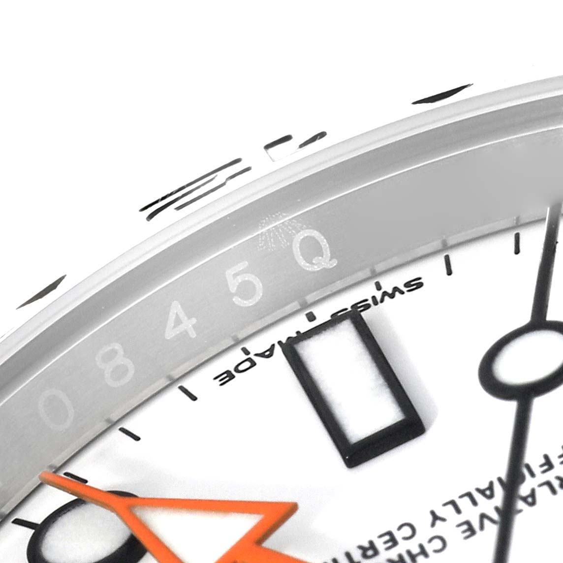 This close-up angle shows the dial, markers, and orange hand of a Rolex Explorer 216570 Men's Stainless Steel White Dial 216570 Men's Stainless Steel White Dial watch.