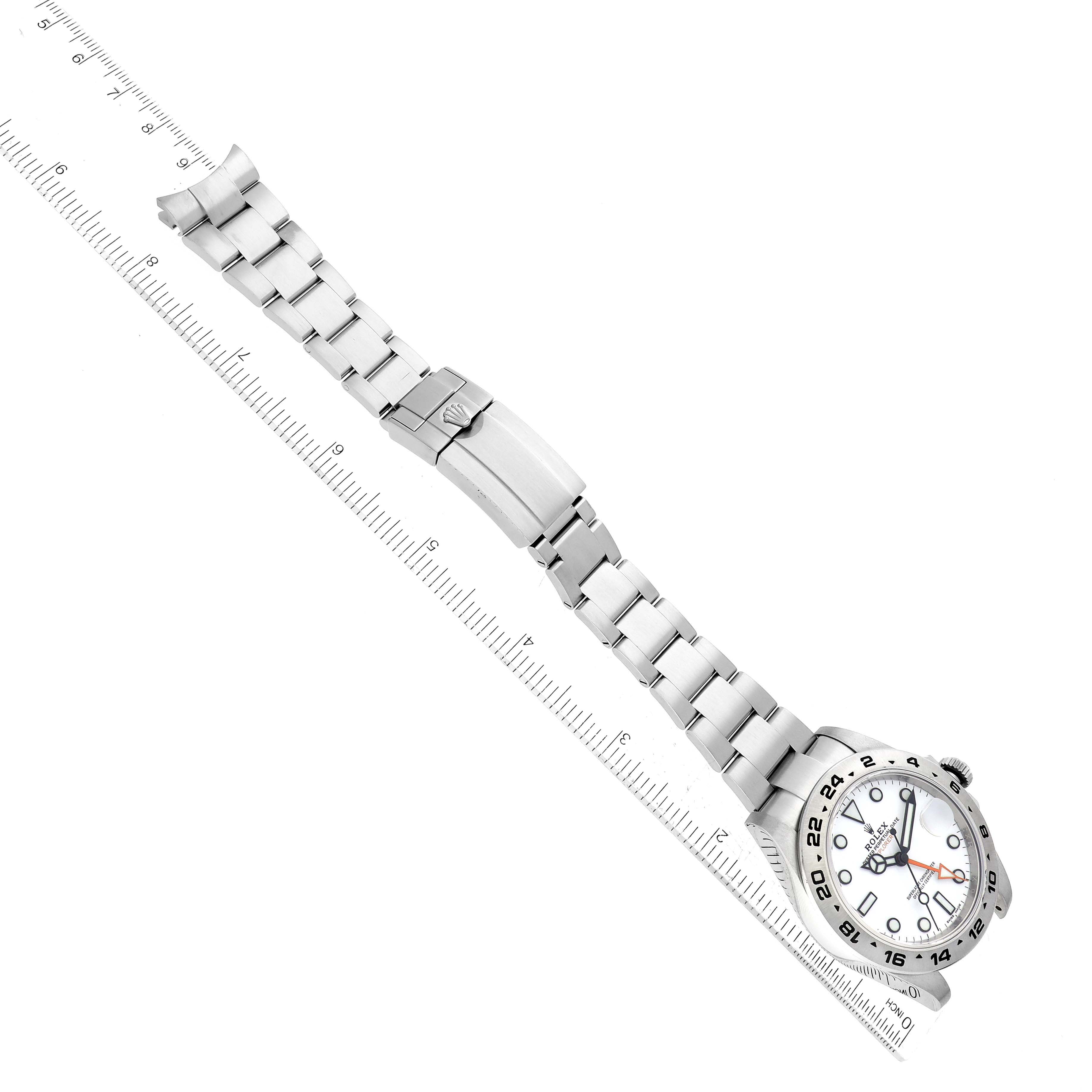 The image shows a Rolex Explorer 216570 Men's Stainless Steel White Dial 216570 Men's Stainless Steel White Dial watch laid flat at a diagonal angle, highlighting the dial, bracelet, and clasp.