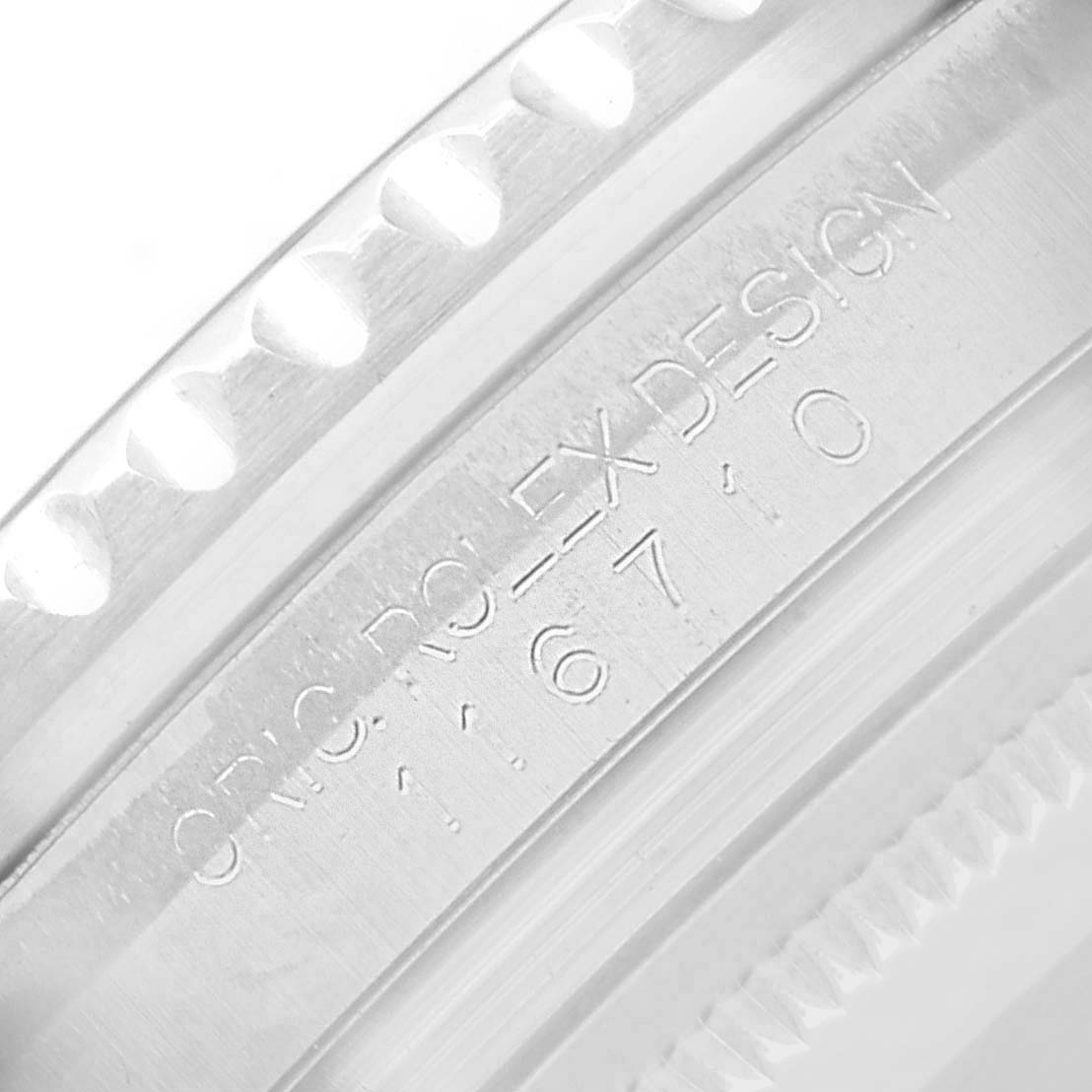 The image shows a close-up of the engraved inner bezel of a Rolex GMT-Master 116710 Men's Stainless Steel Black Dial, displaying the model number.